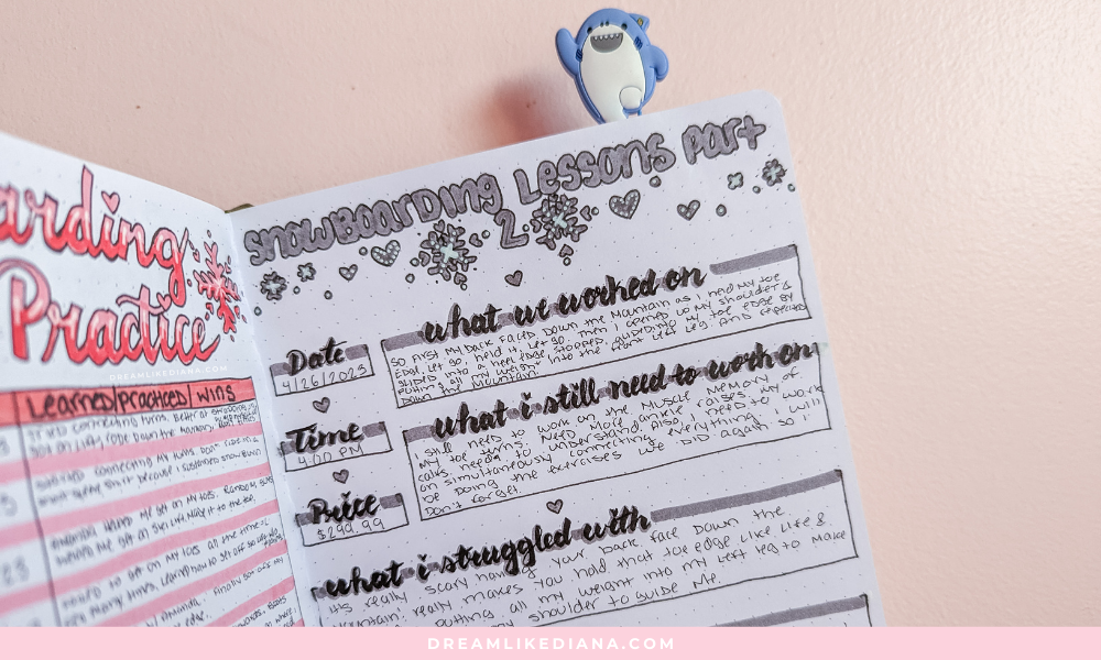 Open journal on a pink background with "Snowboarding Lessons Part 2" heading. Includes date, time, price details, doodles, and text sections. Playful tone.