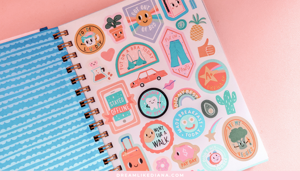 A colorful planner page filled with fun stickers like a pineapple, cactus, and toothpaste. Encouraging messages include “Did My Best” and “Stayed Offline.” Energetic and playful.