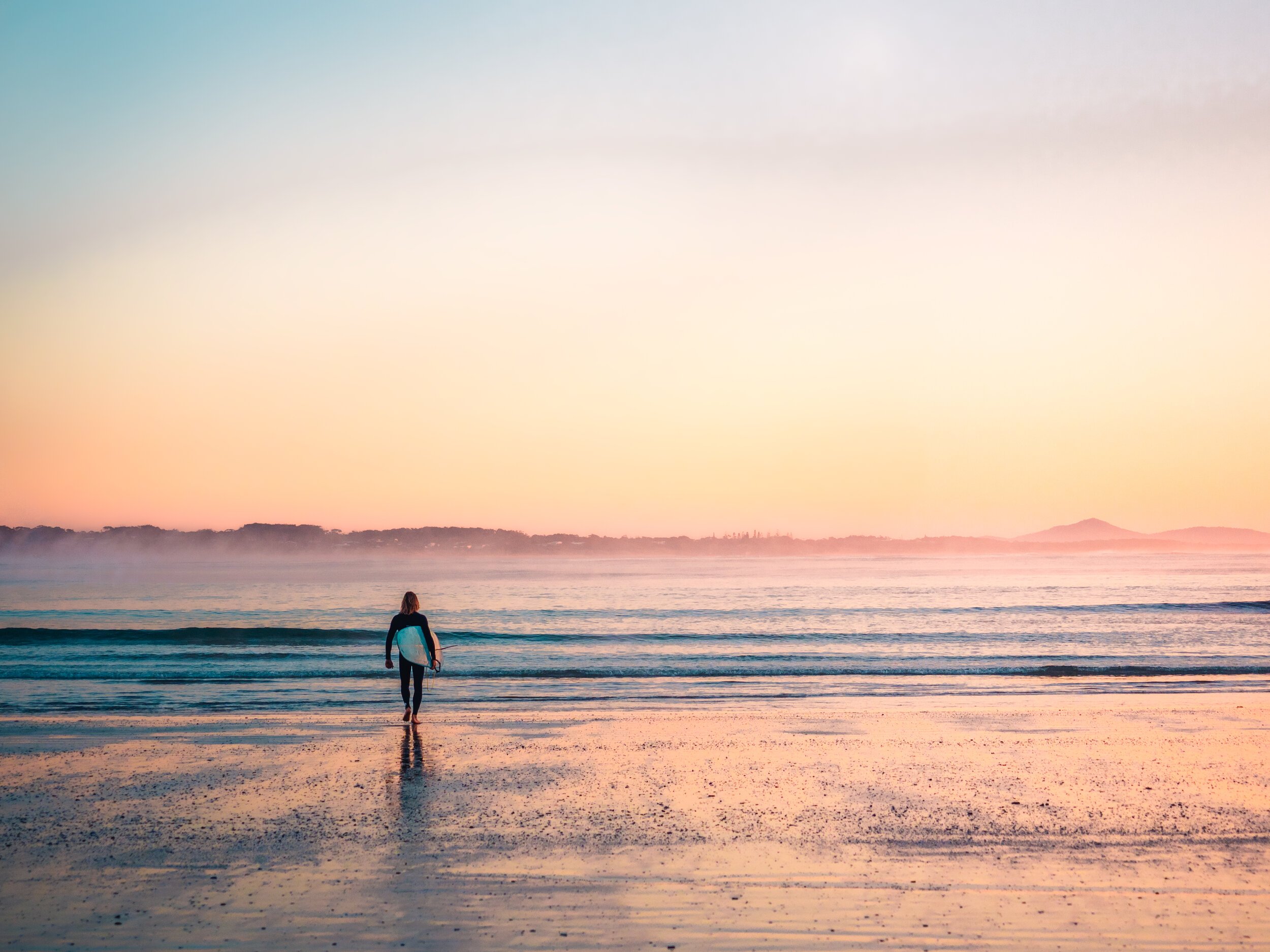 Morning surf with haze on the horizon. Taken at Arrawarra, New South Wales, Australia.