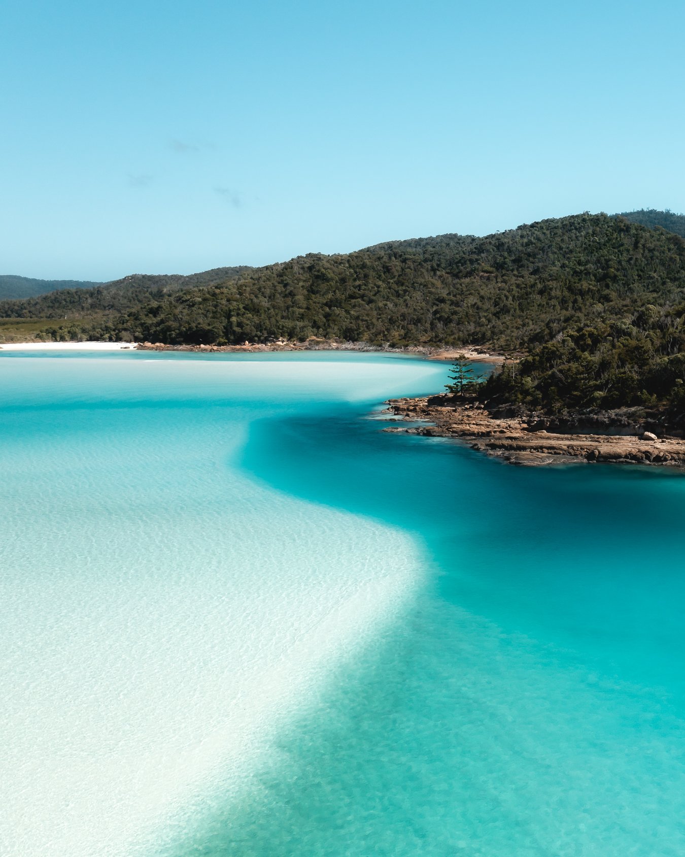 The swirling sands of the Whitsundays up close.
We recently visited our home waters and sailed the Whitsundays once again. With white sands and turquoise waters, this is one amazing destination that you've got to put on your Australia bucket list.