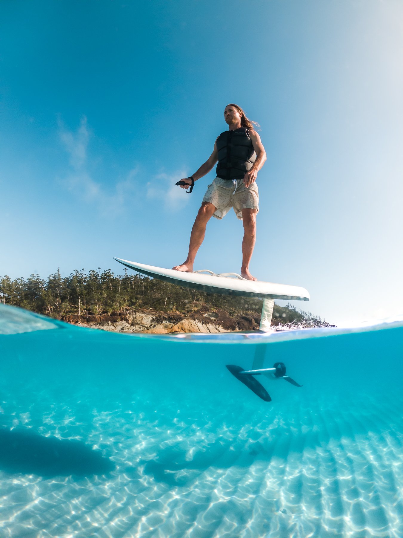 Having a Fliteboard at Whitehaven Beach. Now, this. This was one of those bucket list moments!
Whitehaven Beach is a pristine, award-winning beach famous for its silky smooth white sand and crystal clear turquoise water. And Fliteboards, well, they
