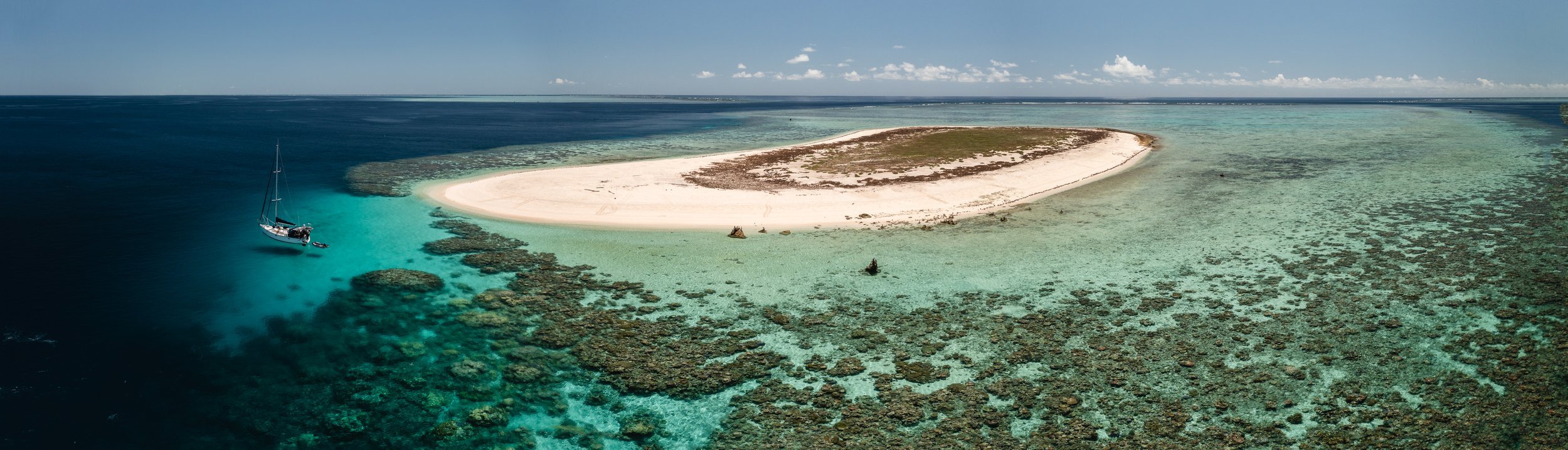 Isolated sand cay off the coast of north Queensland's Great Barrier Reef, the marine life here is insanely unreal.
