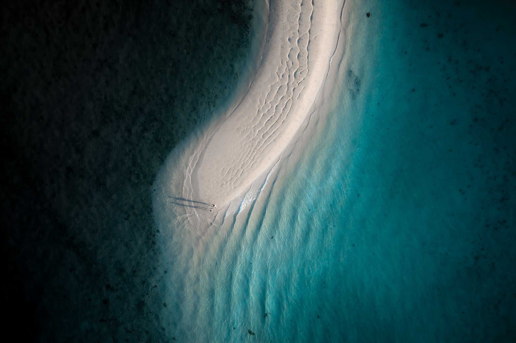 Aerial shot of Langford Island/Reef/Spit. Located nearby are Whitsunday icons Hayman Island resort and Hook Island.