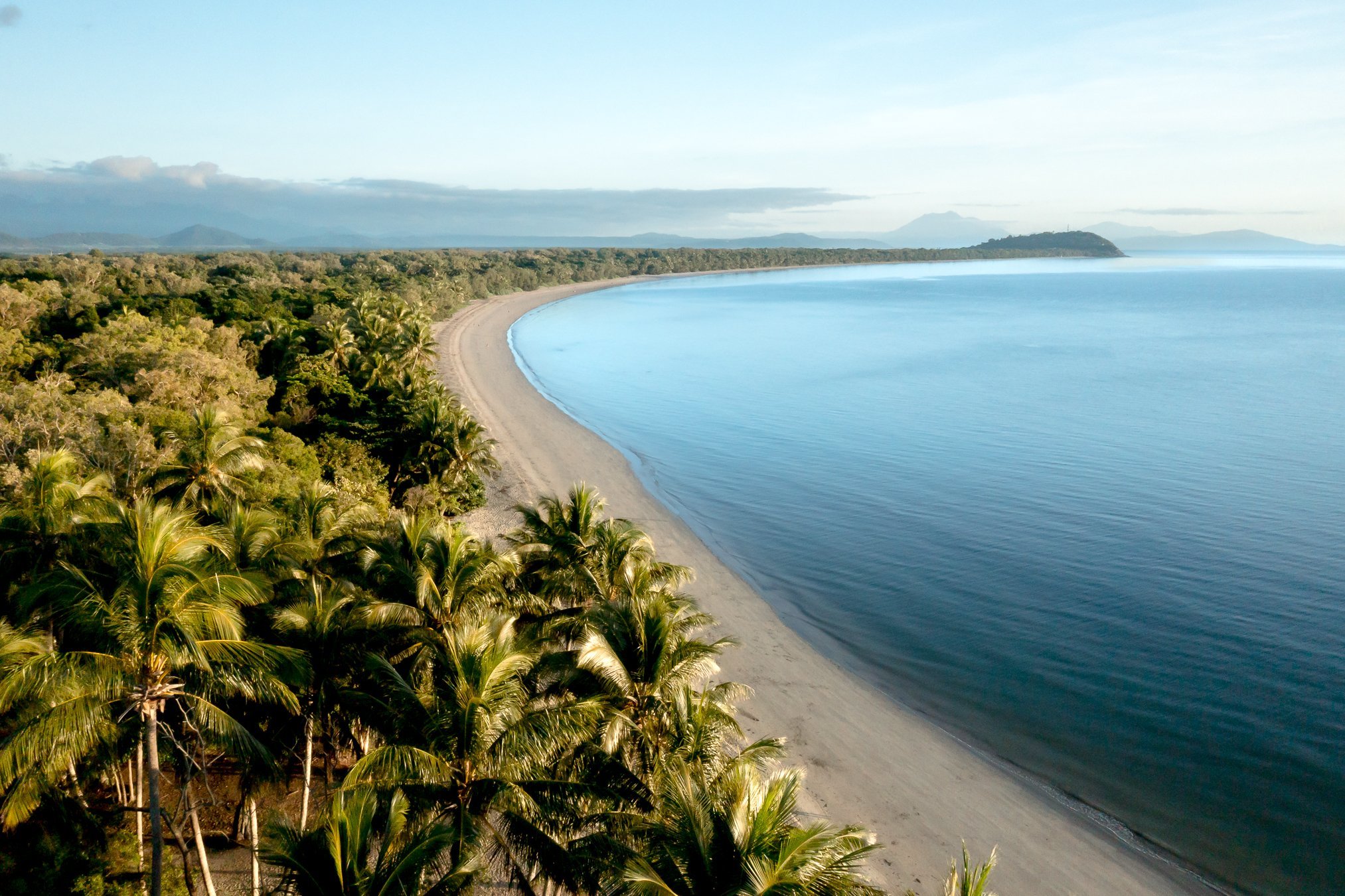 Four Mile Beach is a beach in Port Douglas fringed by palms, with golden sand stretching as far as the eye can see.