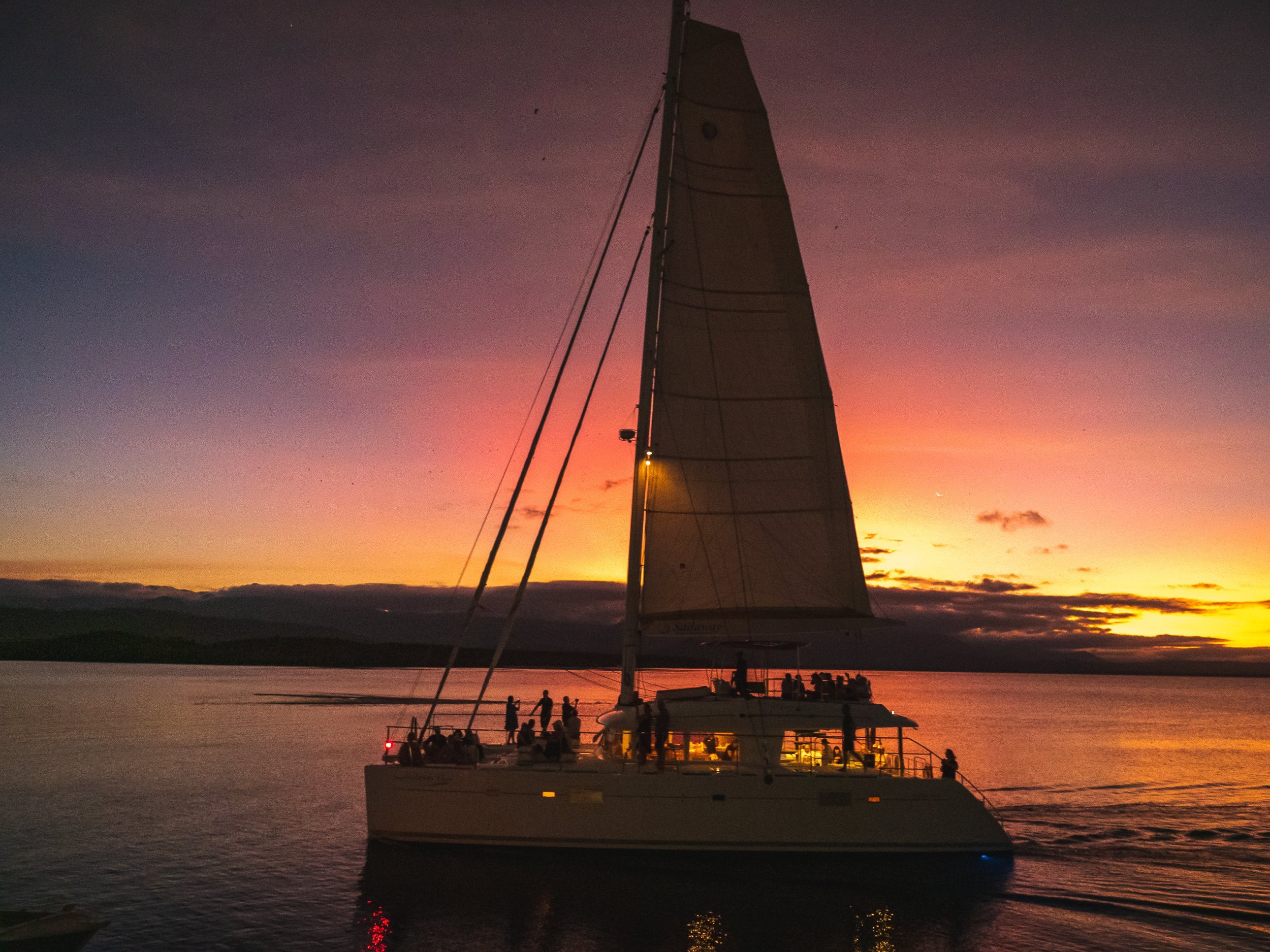 Sailing into the Sunset.
Charter boat, Sailaway sailing back into Port Douglas as the sun sets.