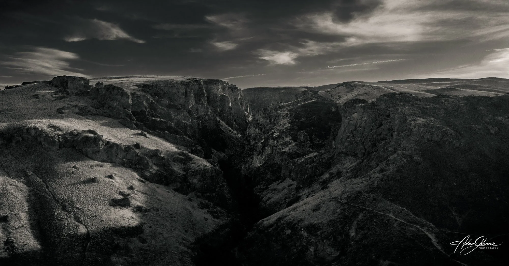 jump_creek_falls_canyon_idaho_black_and_white_drone_shot.jpg