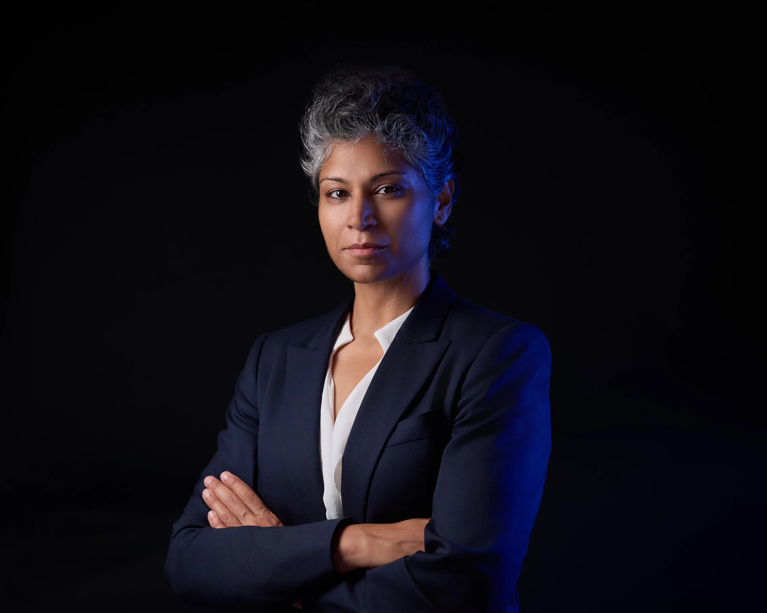 Professional Headshot of a Confident Dr Hamid with Silver Hair.jpg