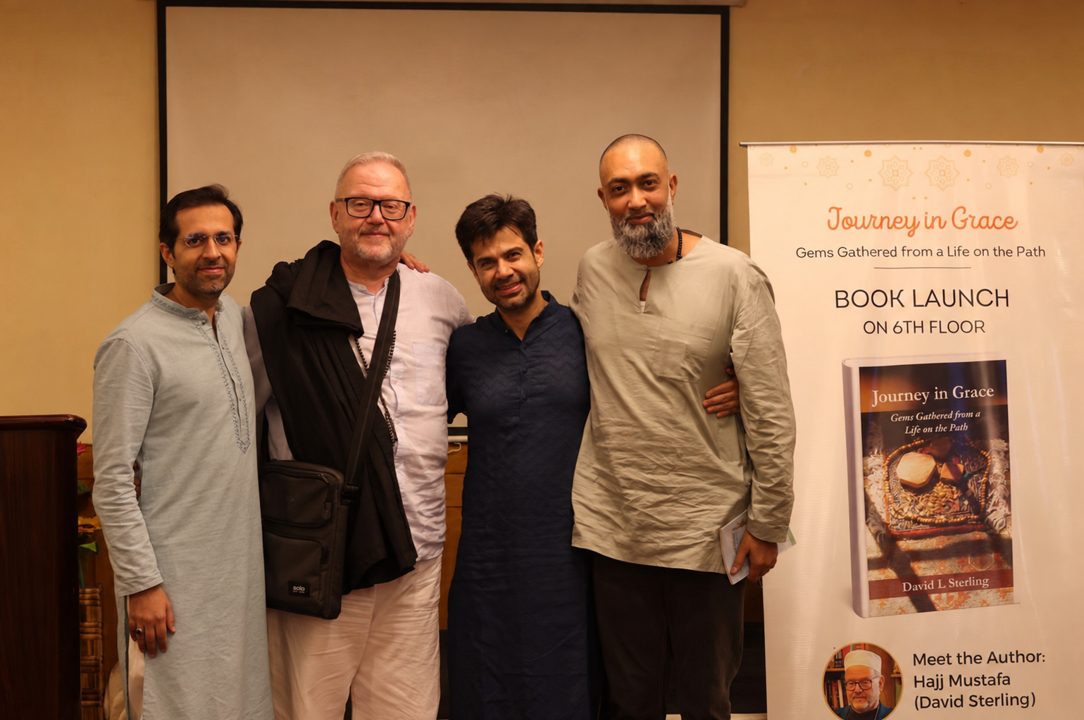 Mohammed Ali Vakil with David L. Sterling and fellow attendees at the Journey in Grace book launch in Bangalore