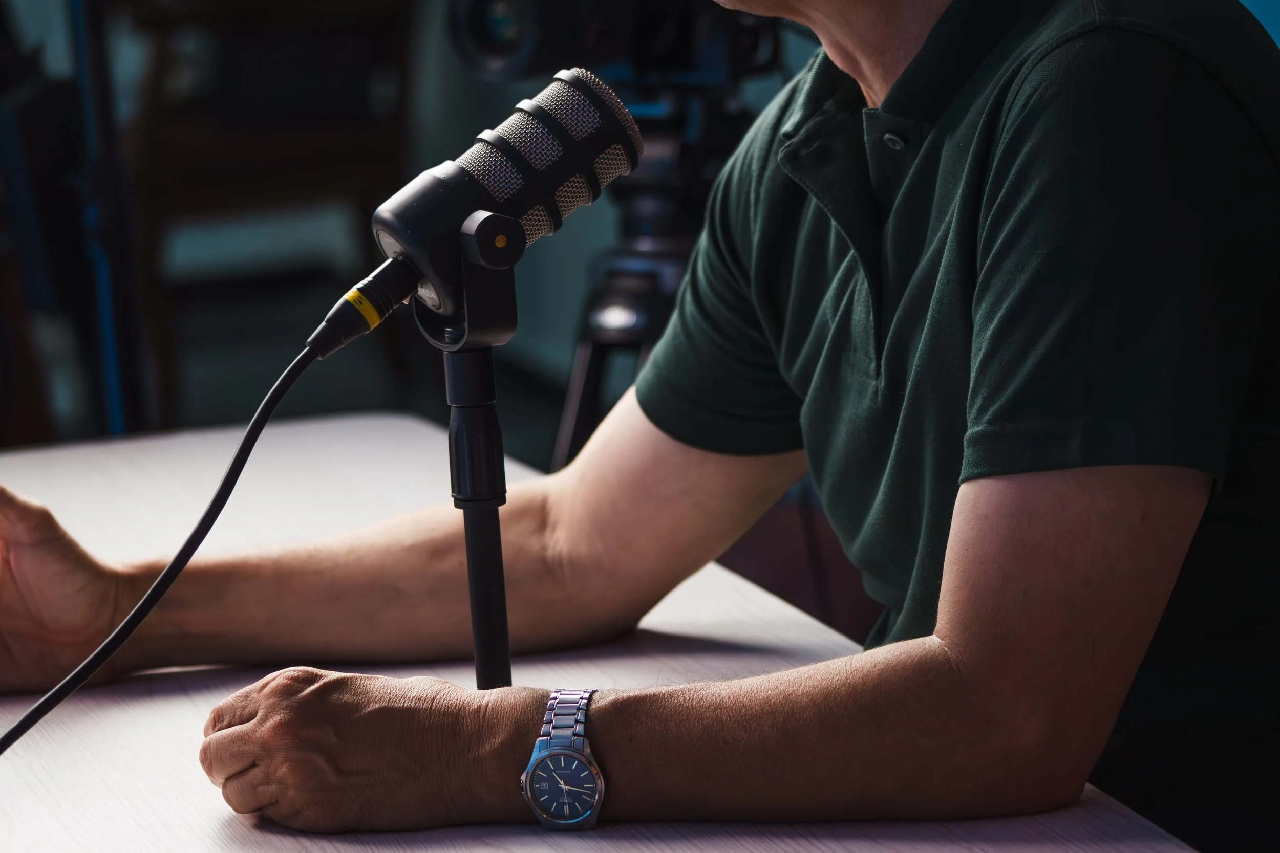 A man recording a uk property podcast