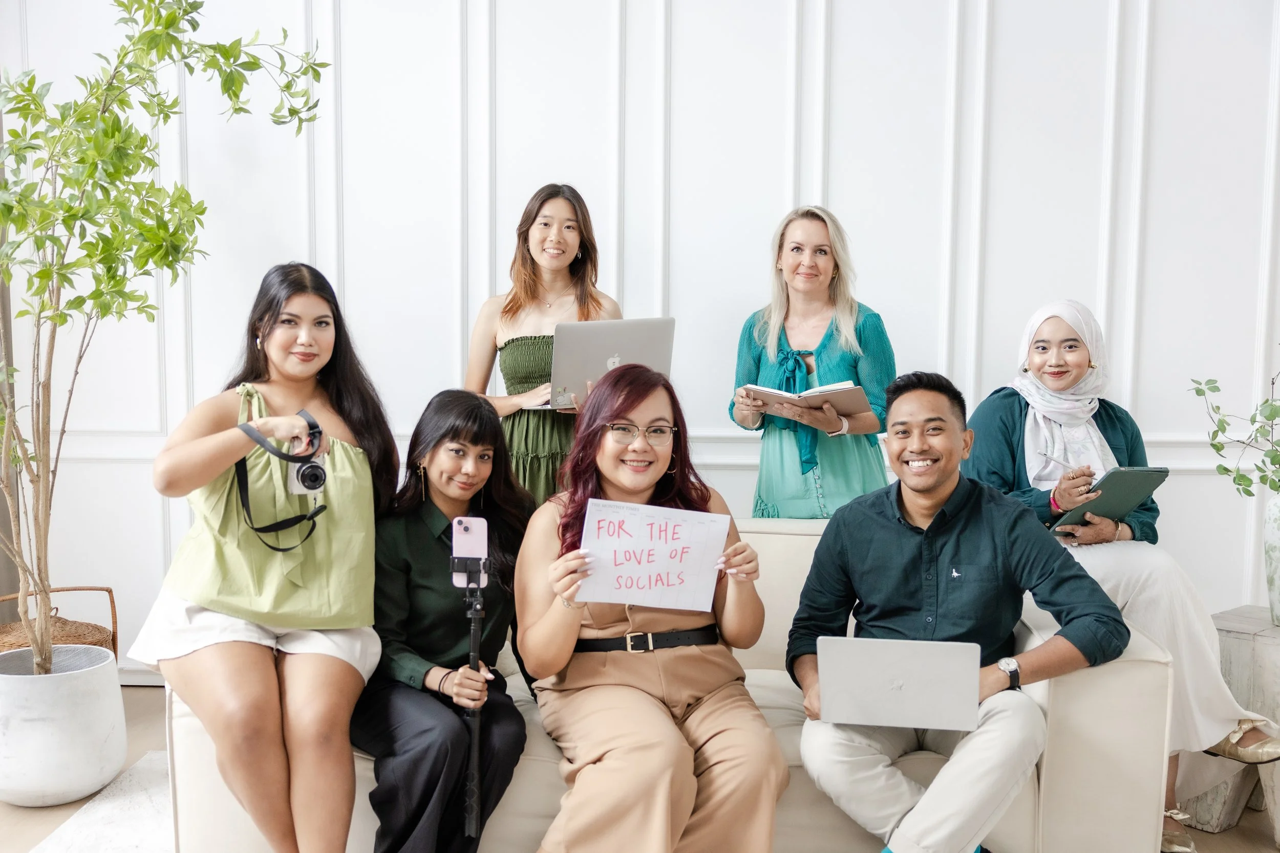 Social media agency team Singapore - seven fortheloveofsocials strategists and content creators collaborating on digital marketing campaigns