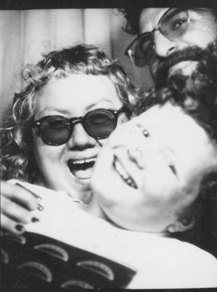 Black and white analog photo booth strip taken in Seattle