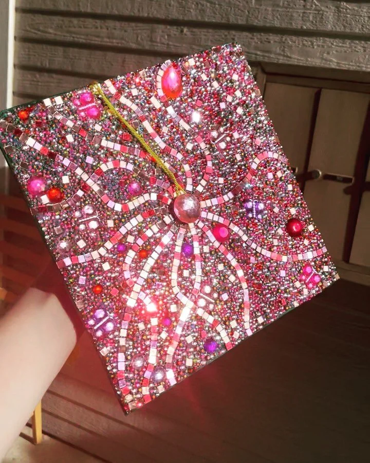Grad cap stoned &amp; degree acquired 😊👍😱🥲✨

╭┈◦&bull;◦❥&bull;◦

#rhinestones#rhinestoned#gradcap#stoned#graduation#mortarboard#theatre#unt#dfw#dfwartist#graduation#costumedesign#deaigner#artist#y2k#y2kaesthetic#shiny#sparkly :)