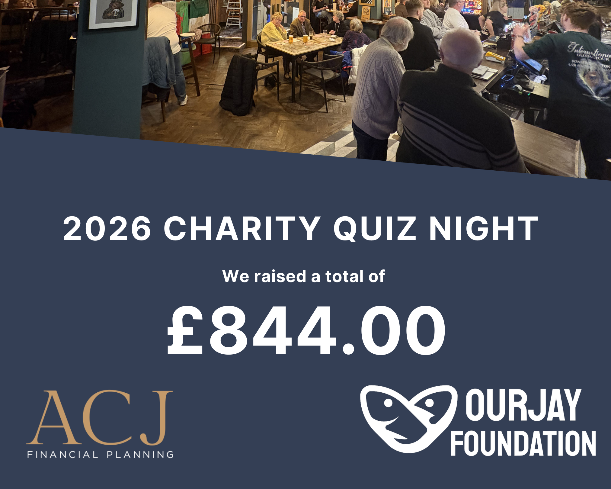 A signboard at a charity quiz night event shows a total amount raised of £844.00, with a background of people seated and standing in a cozy indoor venue.