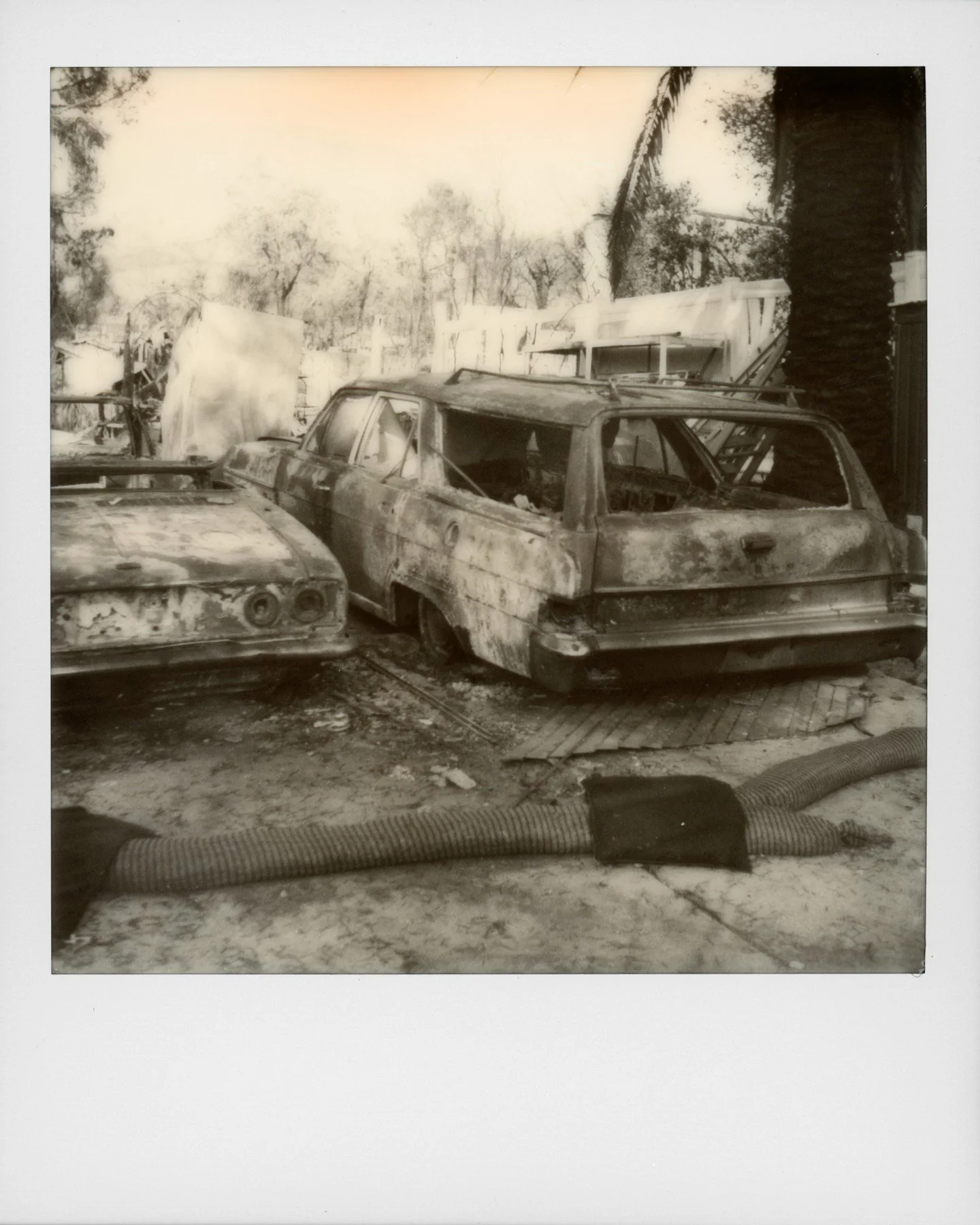 Eaton Fire | Altadena, CA | 2025

The black-and-white polaroids diminish the destruction.  The color photos reveal everything, but you still can't comprehend it unless you are standing in front of it. There is beauty in that stillness.  The community