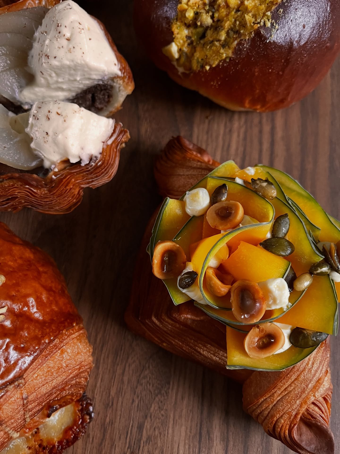 November specials 🌰

-  Smoked Crown Prince Pumpkin, Whipped Goat Cheese + Toasted Hazelnuts.

Buttery, croissant layers filled with a velvety smooth pumpkin pur&eacute;e topped with paper thin slices of Crown Prince pumpkin, that we oak smoked in t