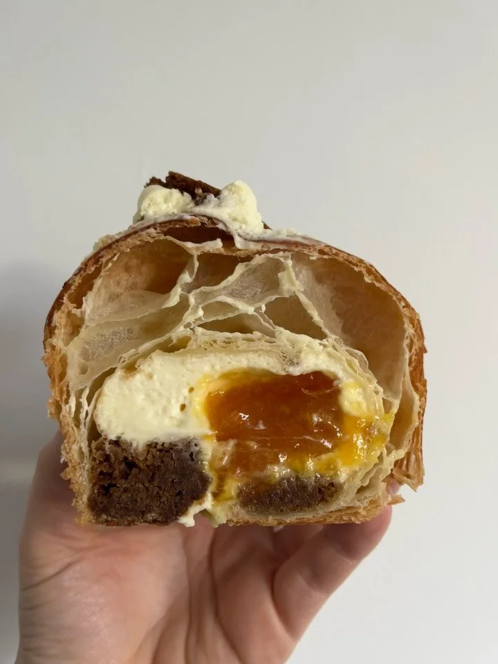 A special special.

Buttery, shattering layers of cross laminated croissant pastry filled with squidgy gingerbread, bitter orange marmalade and a spiced rum ganache mont&eacute;e. Topped with crisp gingerbread.

Available weekends for the rest of Dec