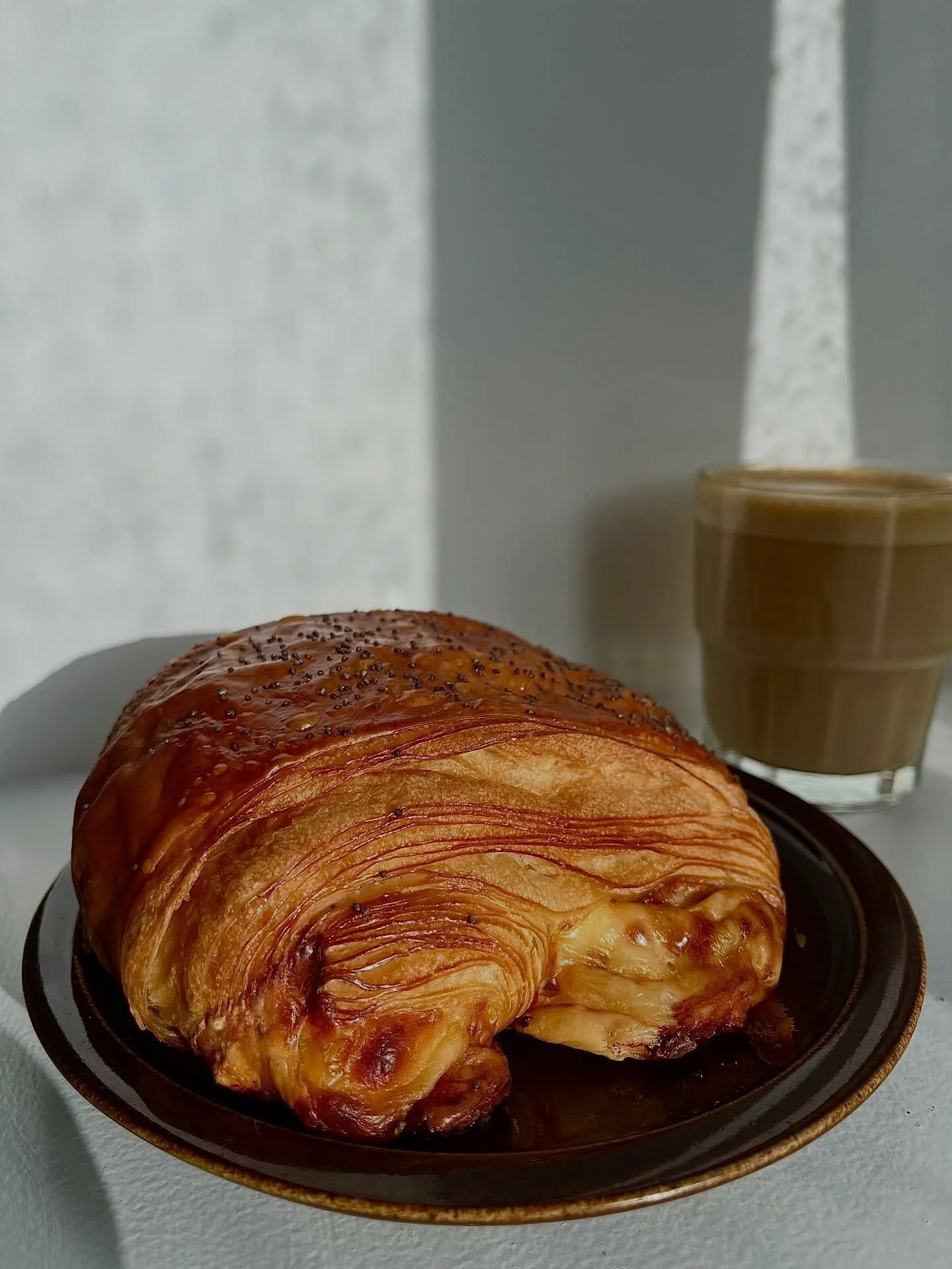Cheese and pickle.

Flaky, buttery croissant filled with melty cheese and lashings of Branston pickle. 

On the counter in both shops everyday 🤎