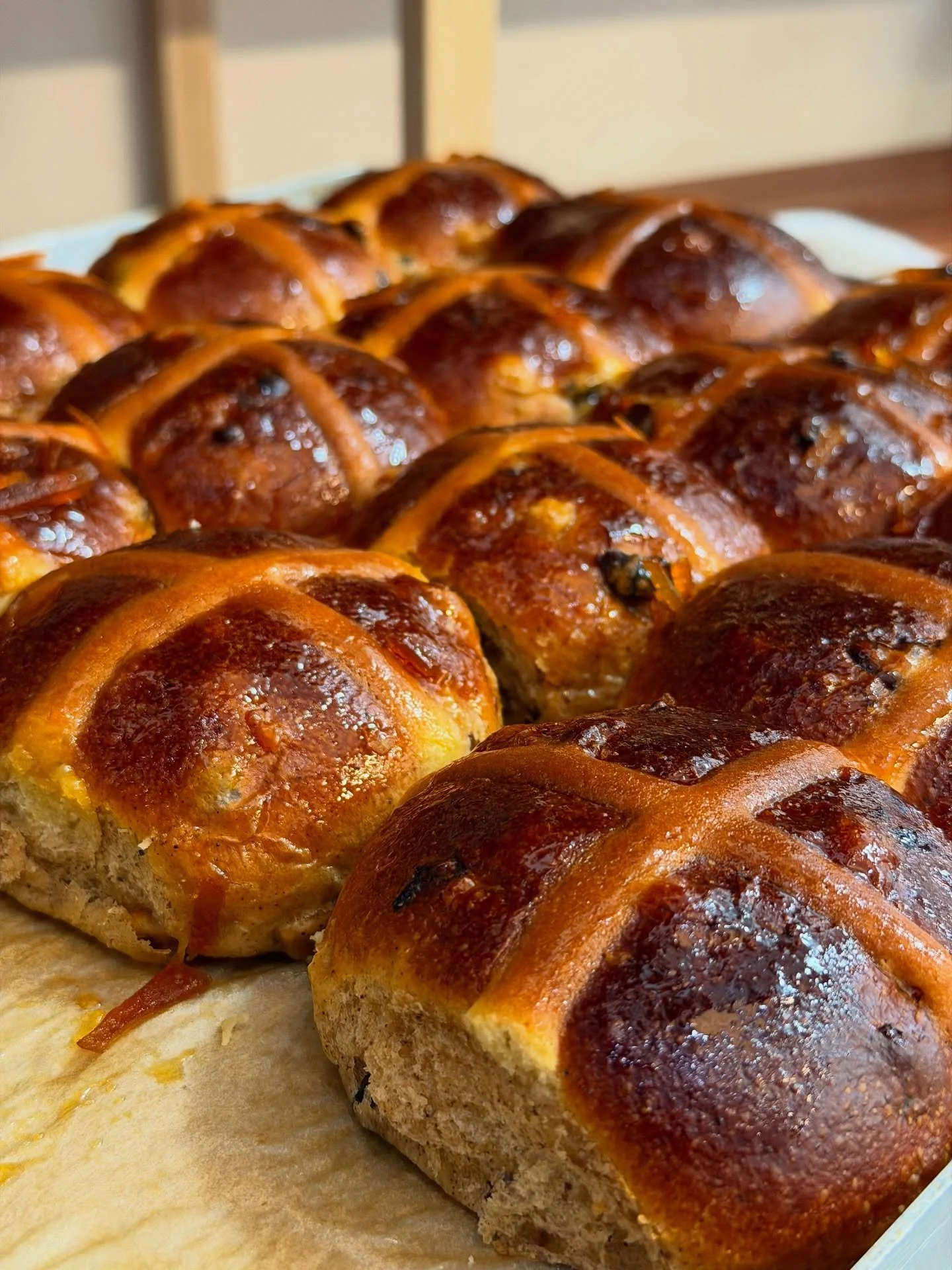 Hot Cross Buns.

Pillowy soft and full of warm spice, plump earl grey and orange soaked fruit with a blood orange marmalade glaze.

On the counter daily in both shops for the season 🧡