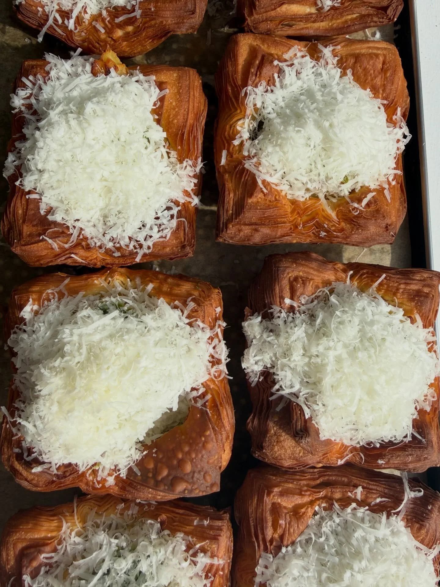 Wild Garlic and Potato.

Buttery, croissant tart filled with wild garlic b&eacute;chamel, layers of @ballymakenny potato dauphinoise, wild garlic pesto and Cais na T&iacute;re.

On the counter everyday in April 💚