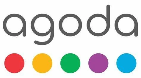Agoda logo with five colored circles below the text.
