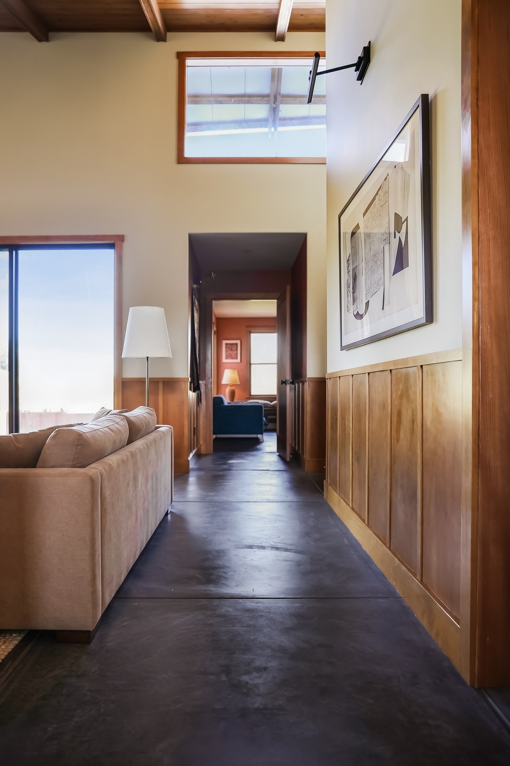 interior-hallway-polished-concrete-floor-wood-wainscot-anderson-valley-boonville-residence-72dpi.jpg