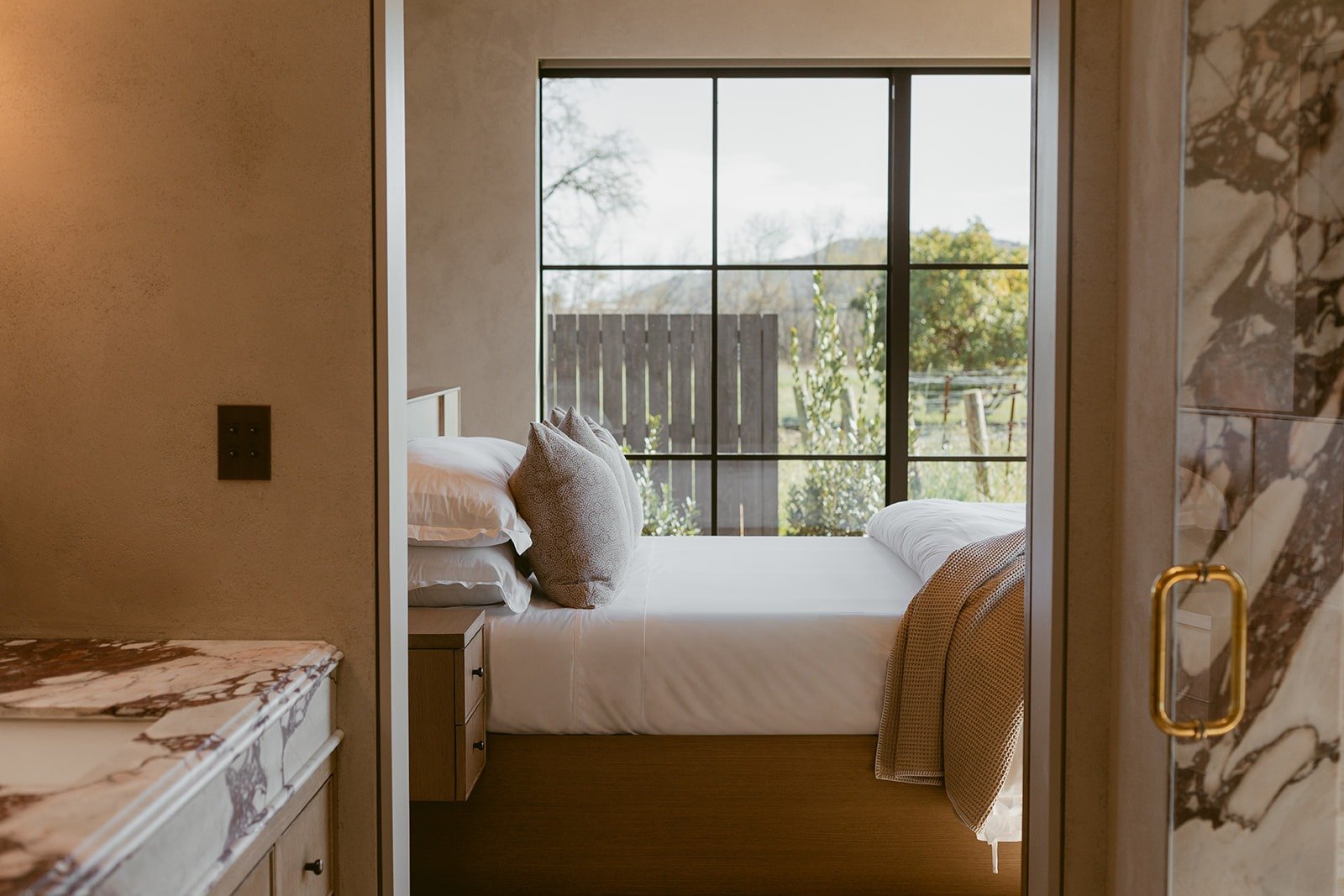 primary-suite-bedroom-view-rutherford-villa-72dpi.jpg