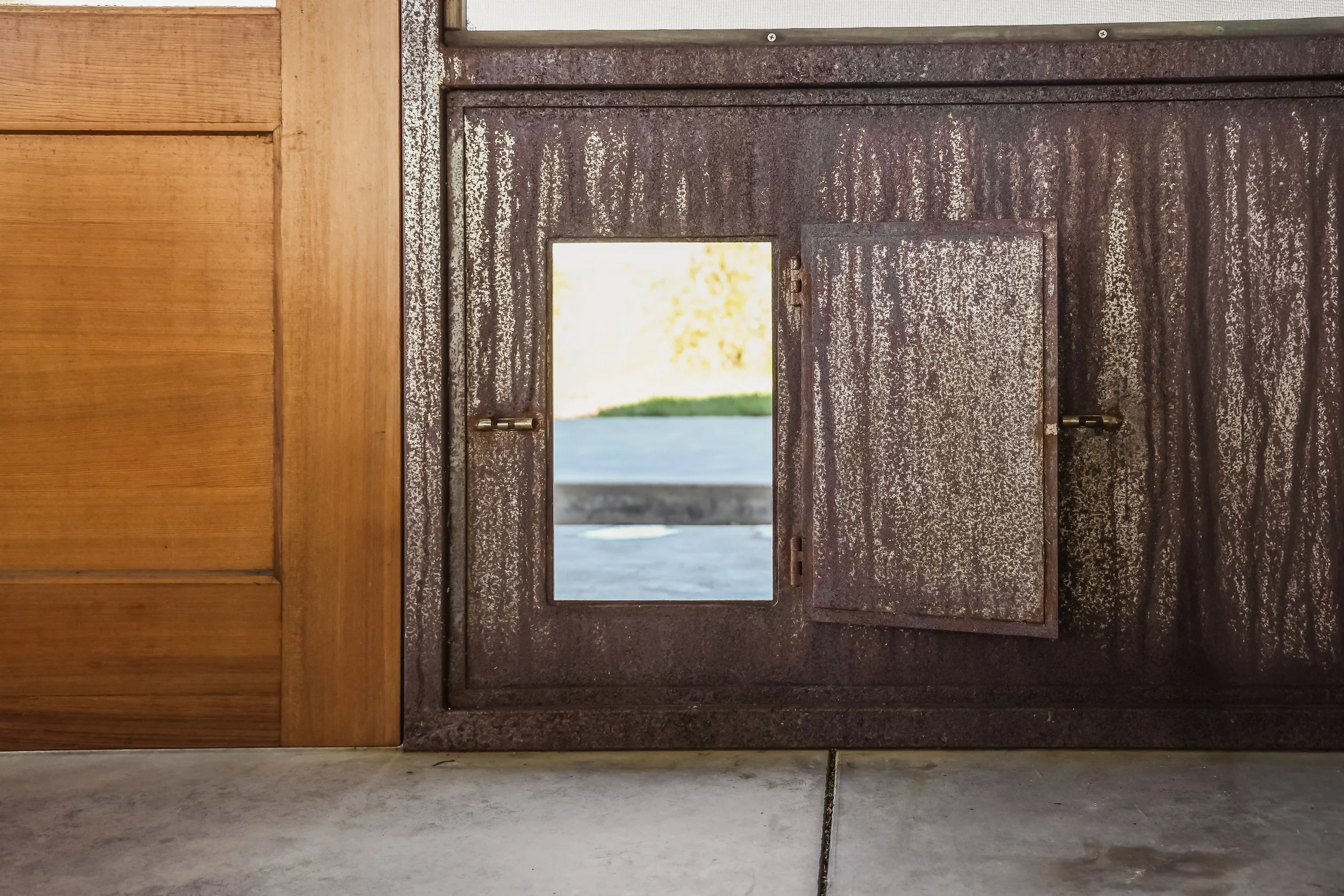 corten-steel-panel-hinged-window-screened-porch-anderson-valley-boonville-residence-72dpi.jpg