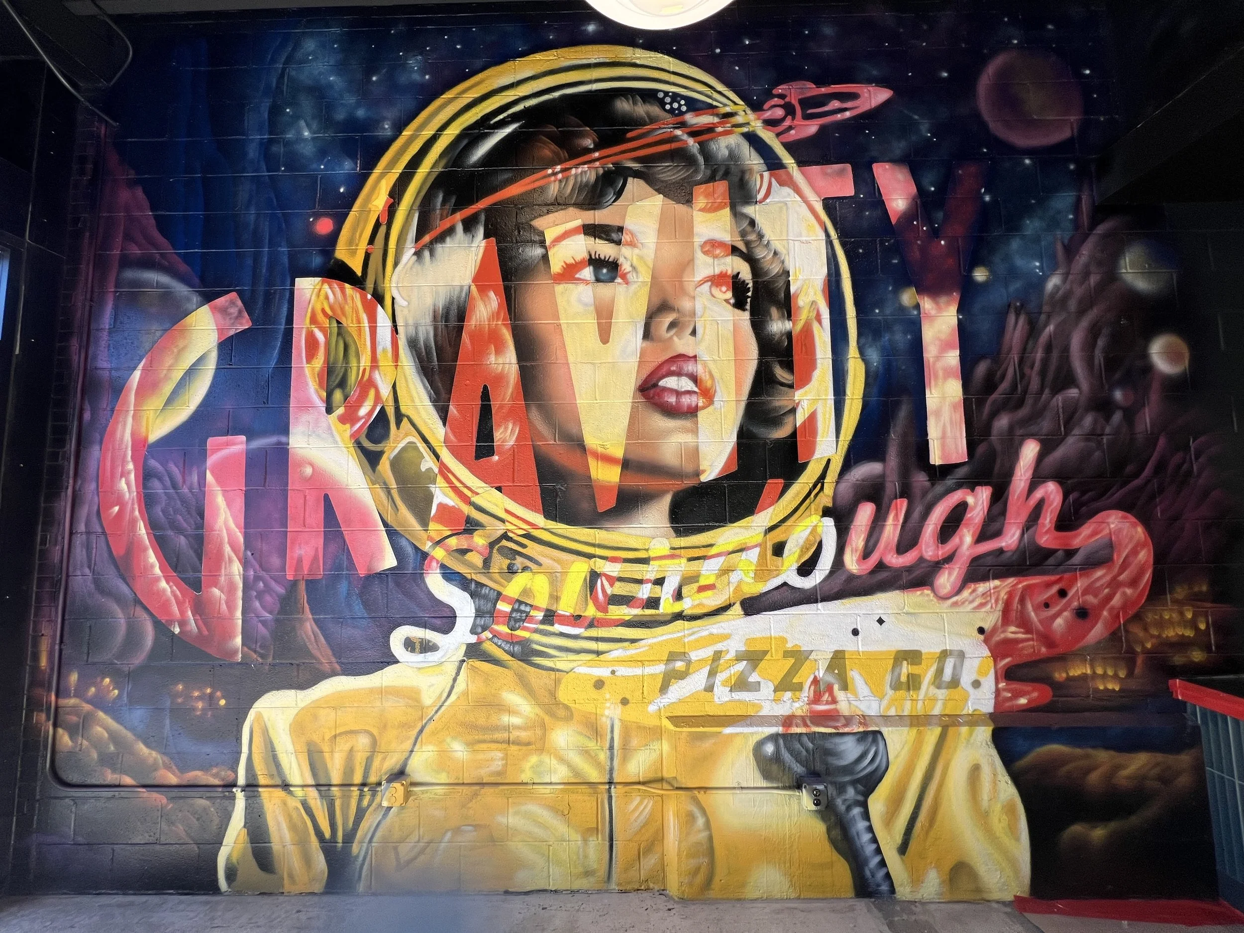 colorful Retro vintage mural for a pizza business at Camp North End in Charlotte, NC