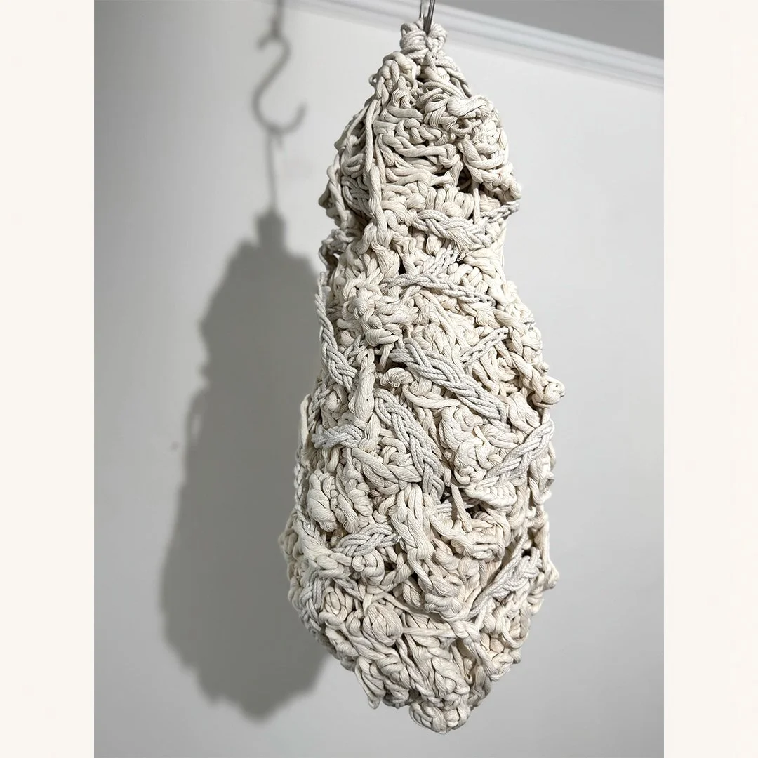 Eileen Lang | The Weight of Holding | Cotton Cord, Nylon Rope, Steel Hook | 27 x 9 x 9 inches