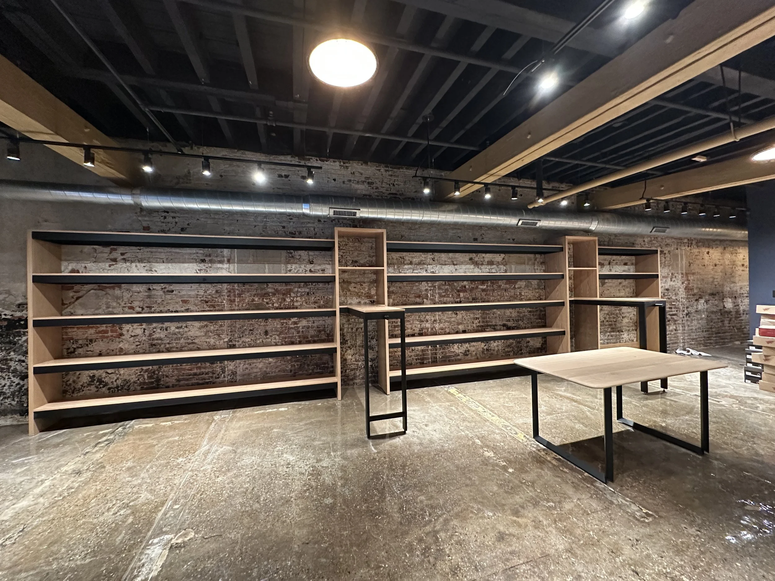 Steel Components for Todd Quarles shelving display at Franklin & Poe