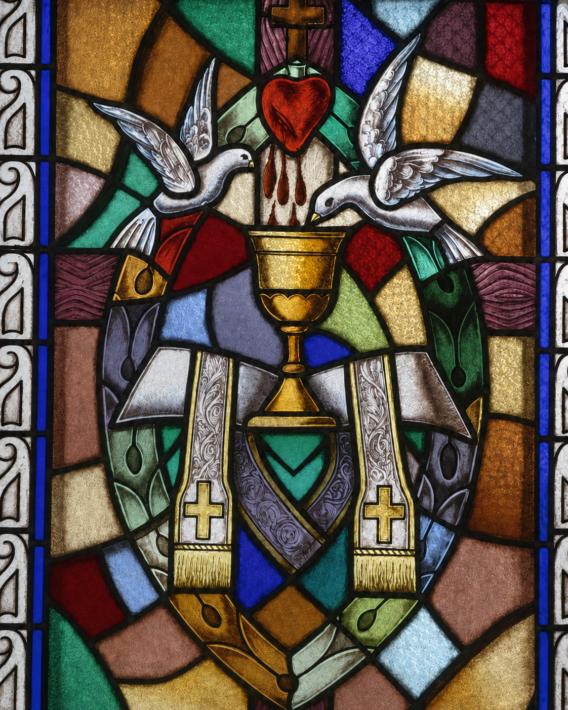 Holy Eucharist stained glass. Photo by Zvonimir Atletic.