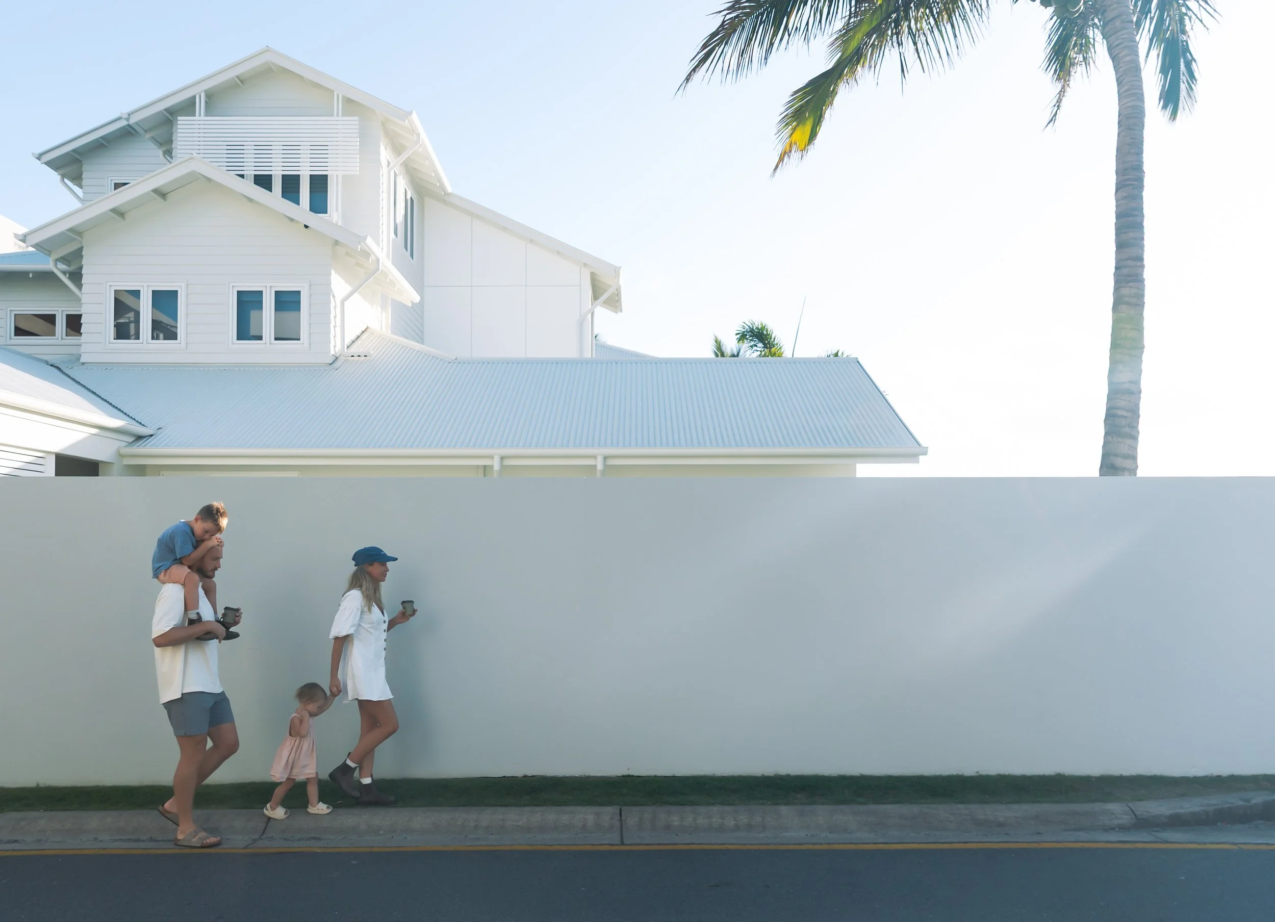 Family at beach by gold coast family photographer