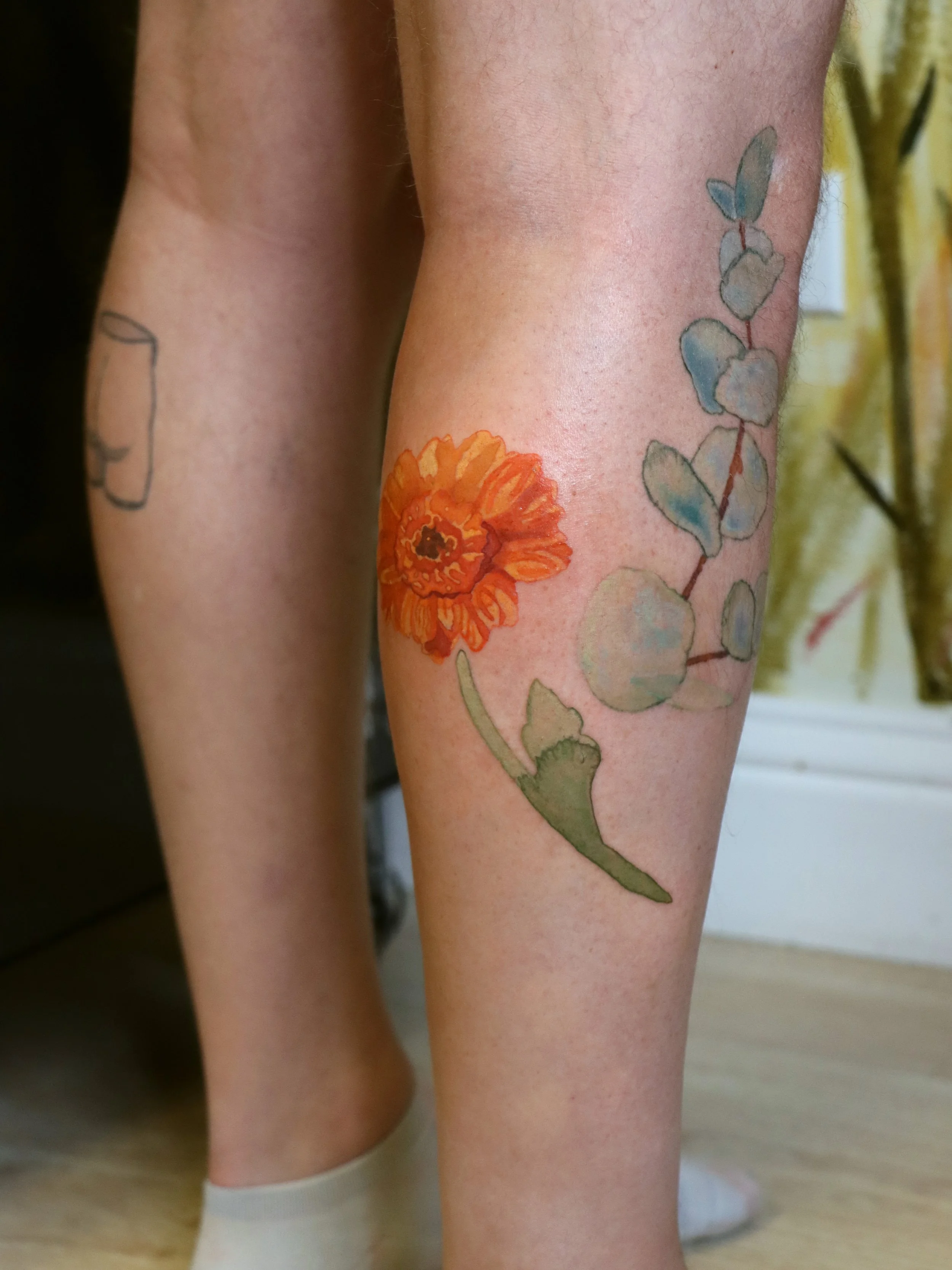 daisy tattoo 1.jpg