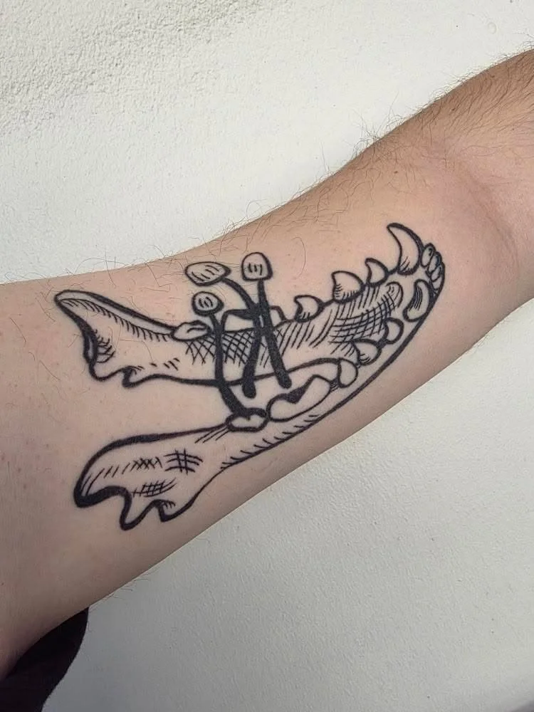 asa jawbone tattoo healed.jpg