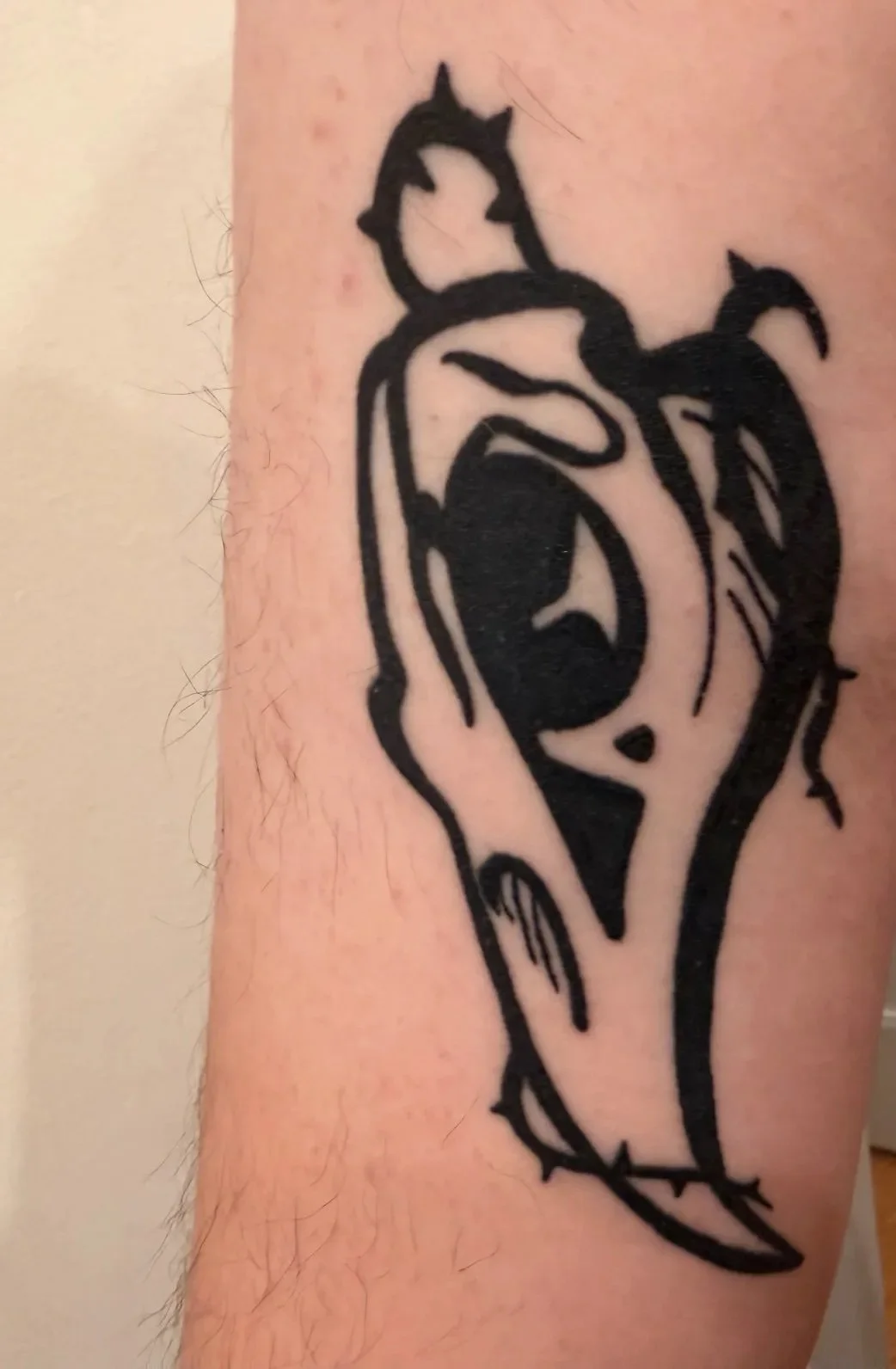 asa skull tattoo healed.jpg