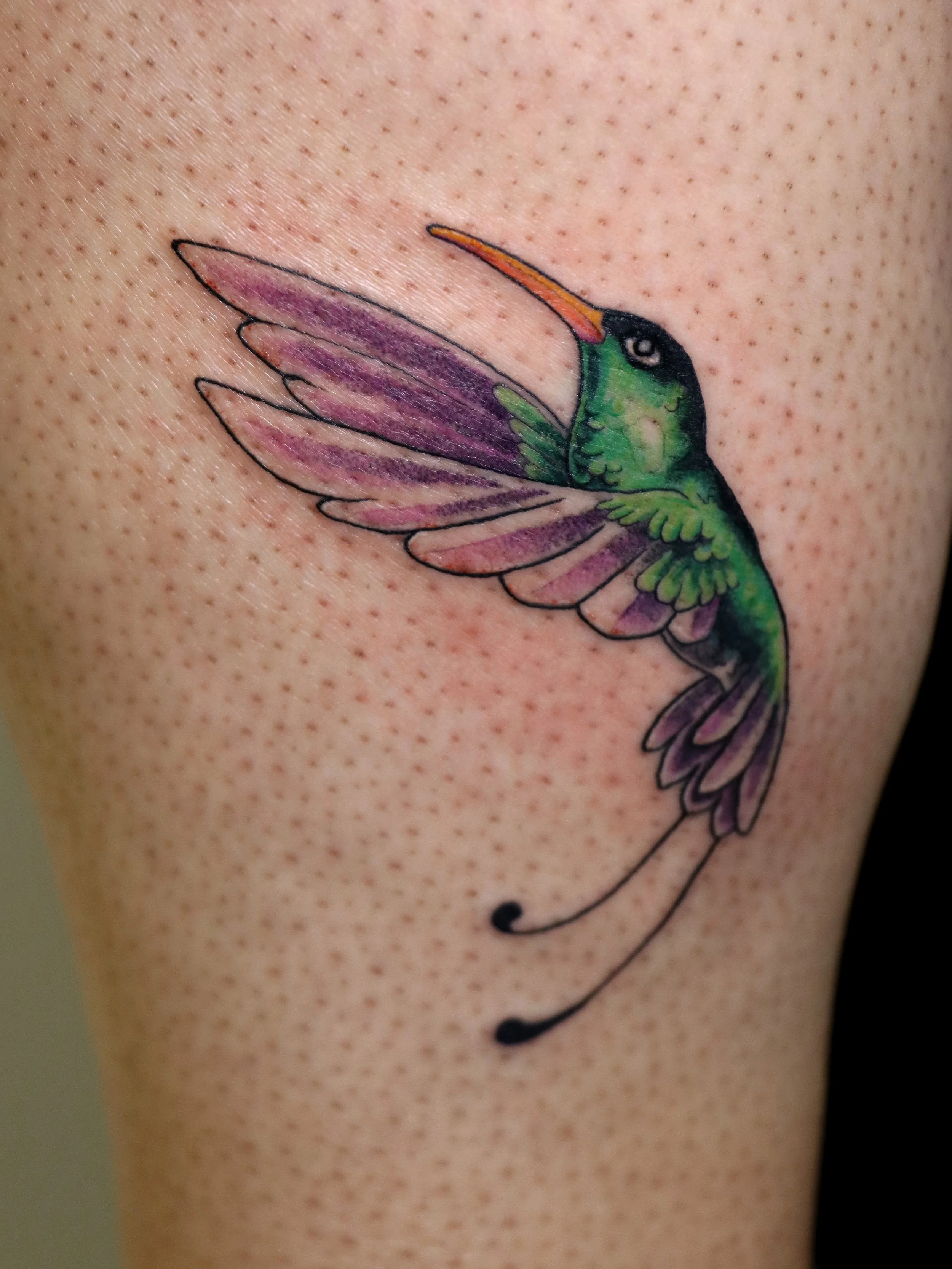 hummingbird christina tattoo closeup.jpg