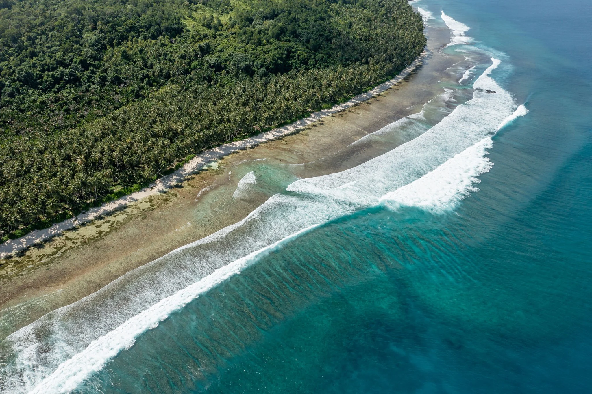 Views from above give a totally different perspective of the reef below.

Telo Beach House 2026 bookings are open &mdash; secure your spot now at www.telobeachhouse.com 

#telobeachhouse #sunsetvibes #teloislands #tropicalsunset #surftrip2026 #indosu