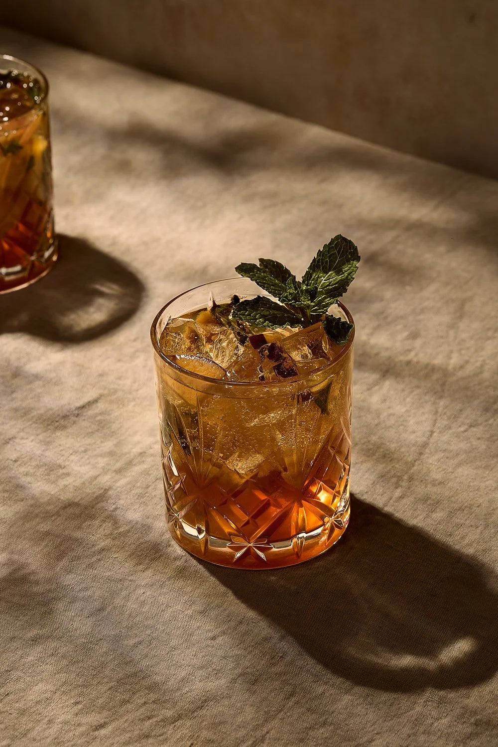 peach-bourbon-smash-cocktail-close-up-mint-ice.jpg
