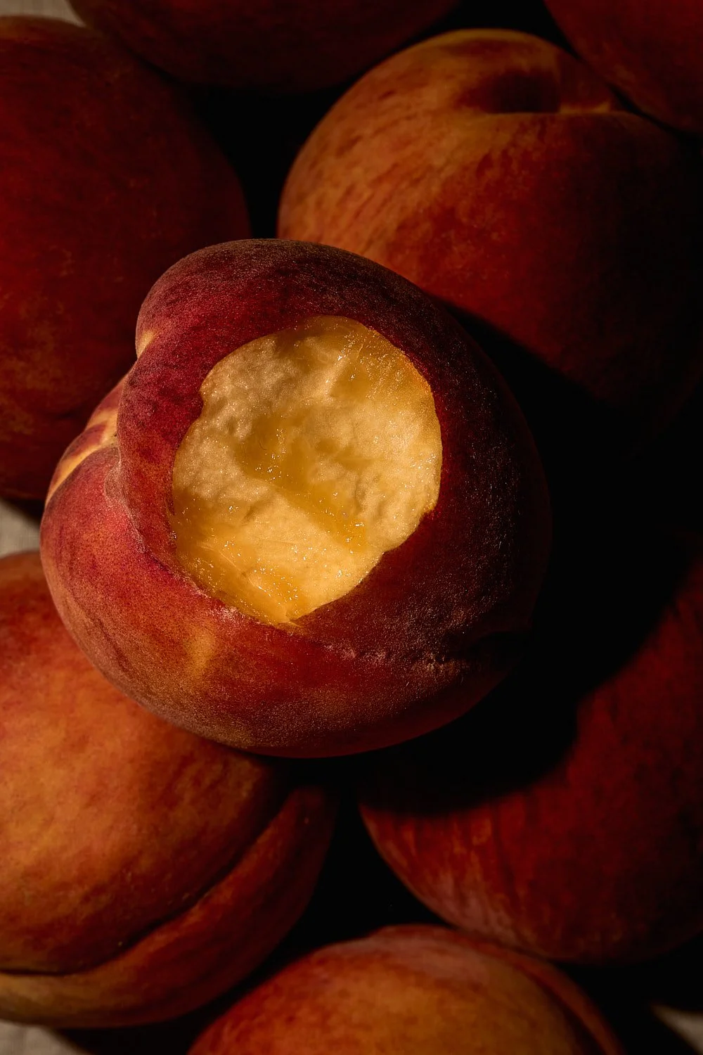 peach-close-up-bitten-fruit-stack-bourbon-cocktail-photography.jpg