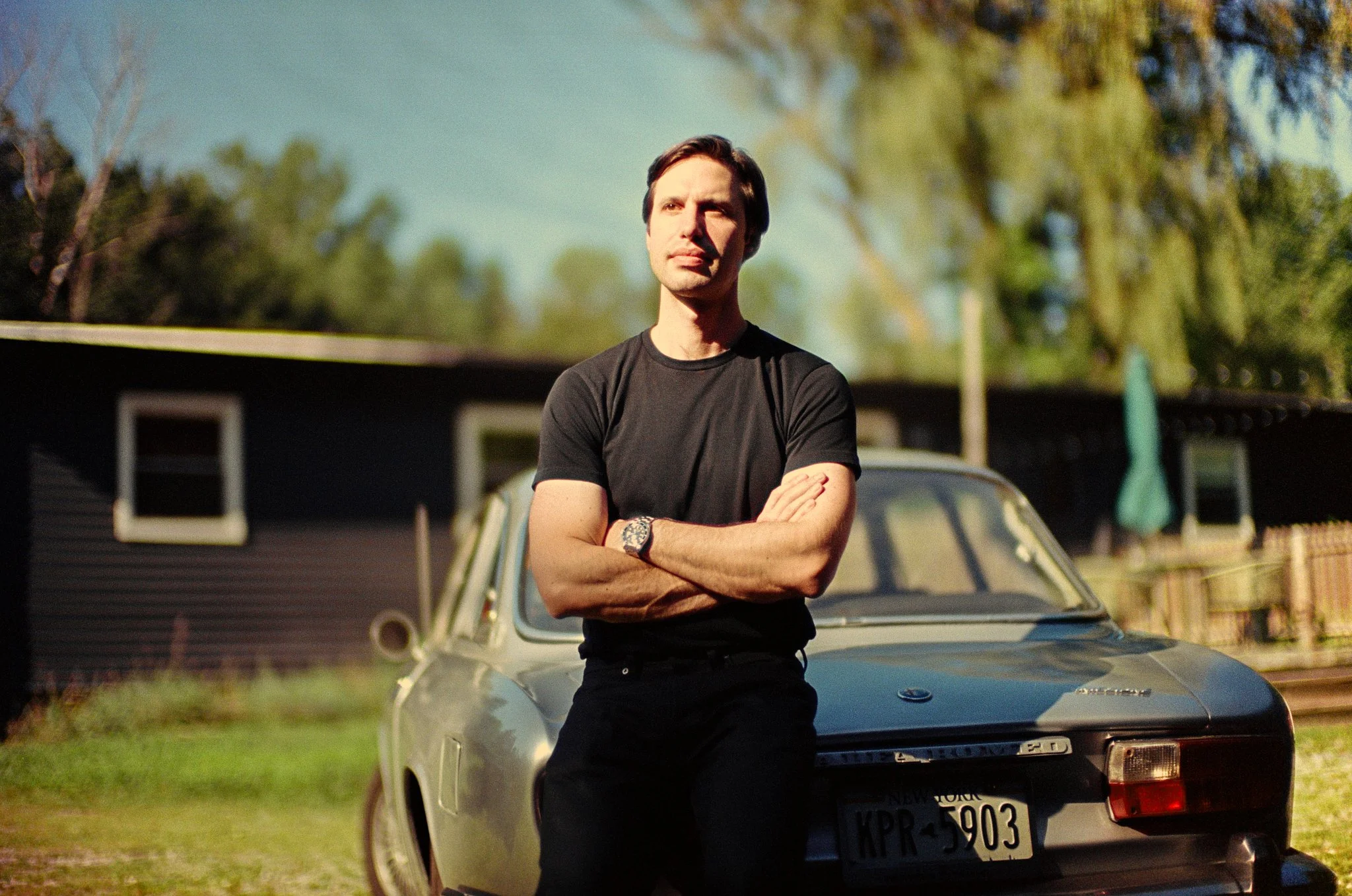 Portrait brand photography by New York commercial photographer Adam Lerner - A man with a vintage Alfa Romeo in upstate New York
