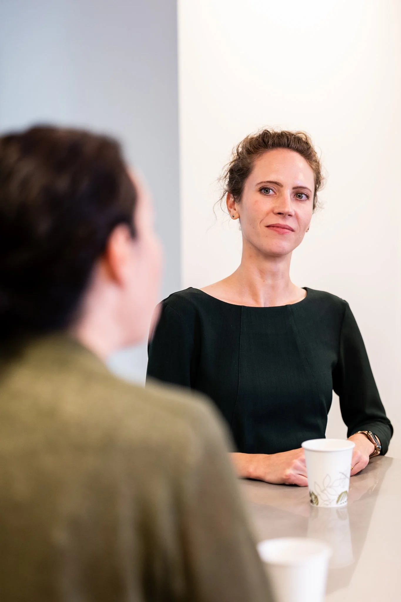 Work life brand photography by New York commercial photographer Adam Lerner - Women at work in an office in New York City