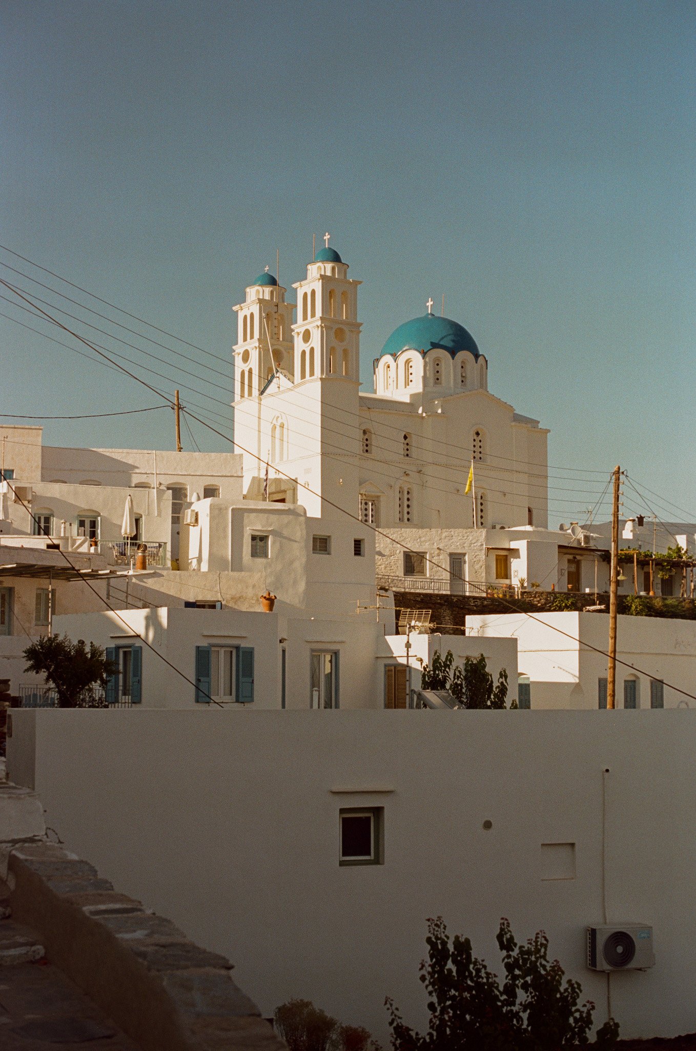 Travel brand photography by New York commercial photographer Adam Lerner - Mediterranean street and church on a greek island.