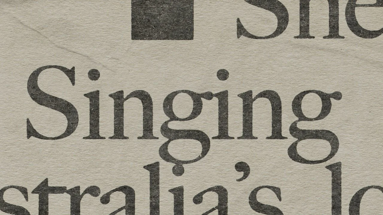 063 newspaper_SINGING Large.jpeg