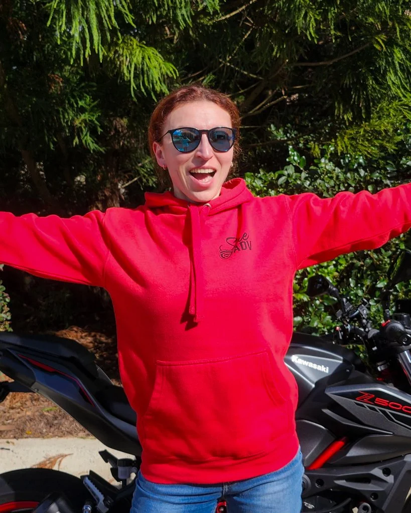 Woman Exploring on Two Wheels Hoodie