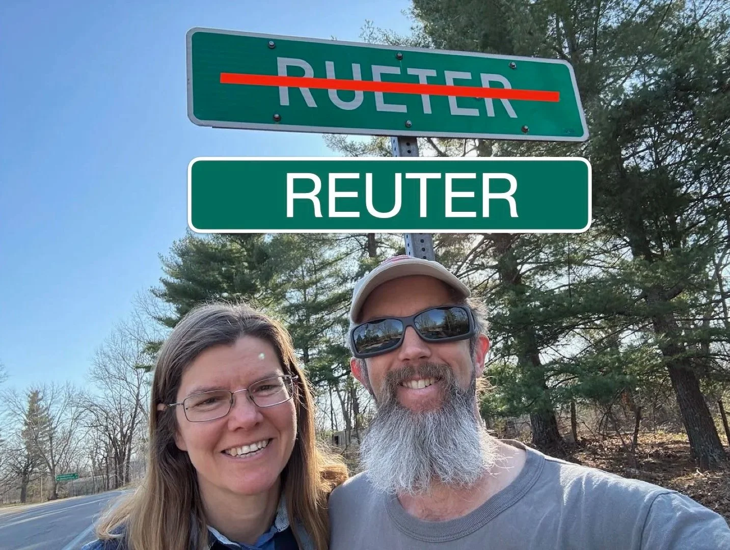 Eric and Joanna in front of a mis-spelled road sign
