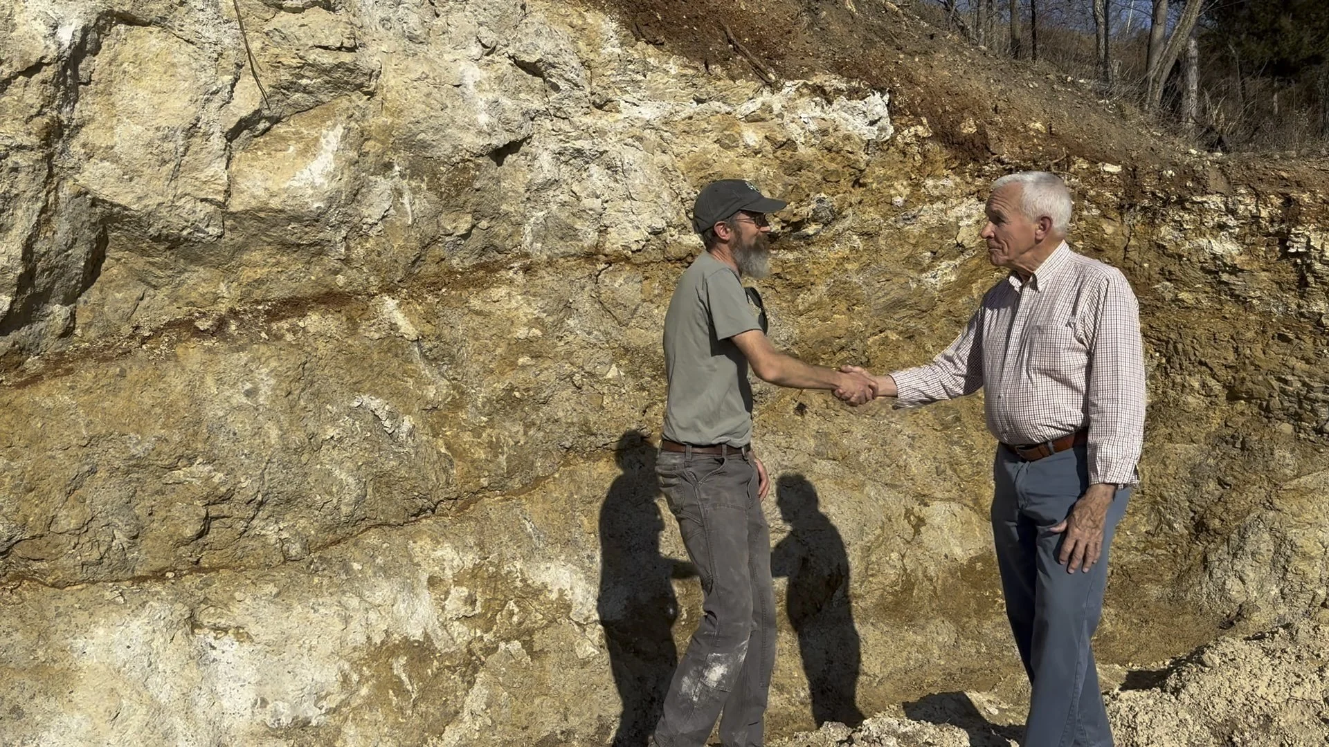 Eric shaking hands with a site visit host