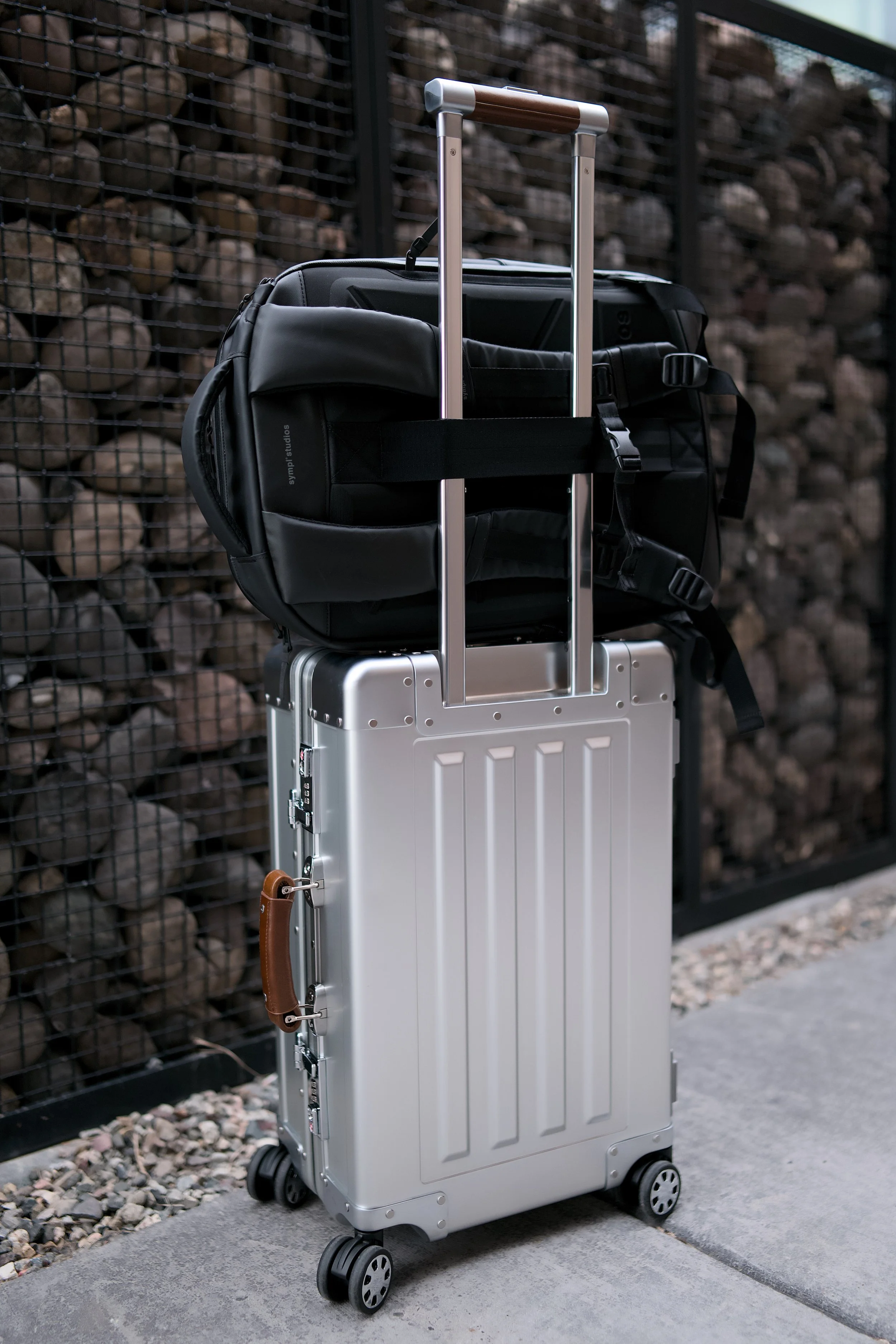 Sterling Pacific 40L Aluminum Carry-On With Sympl Studios Backpack On Top