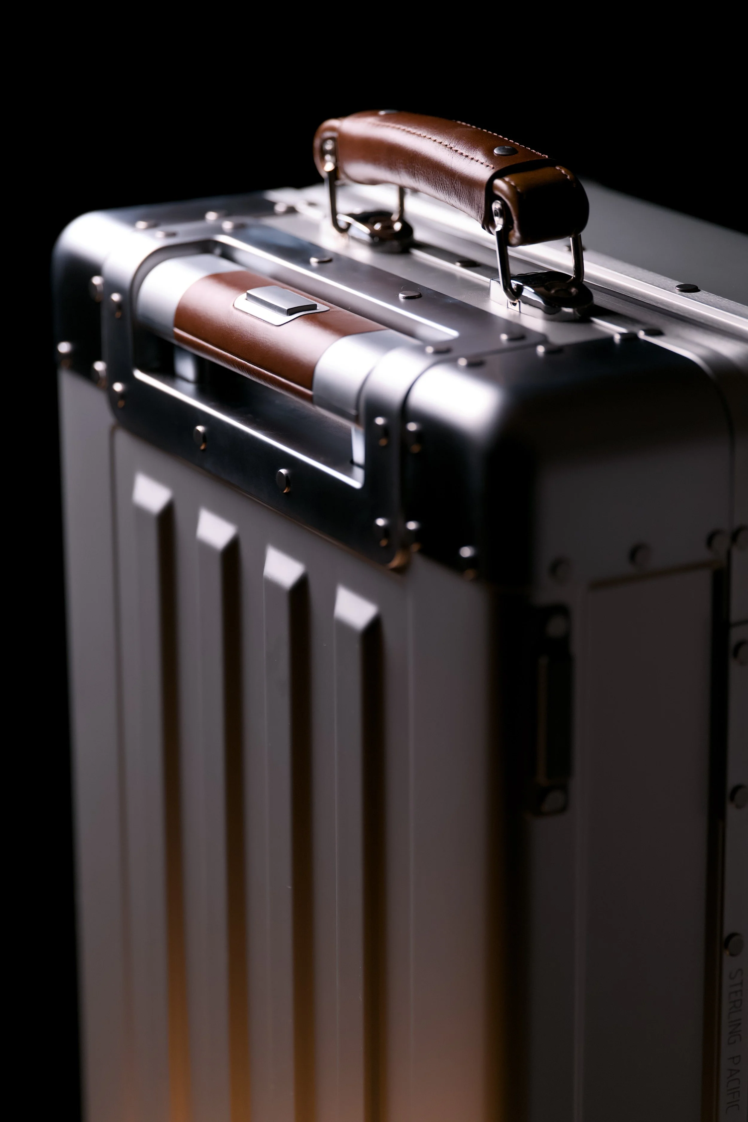 Rear Of The Sterling Pacific 40L Carry-on. The Trolly Handle Is in Focus