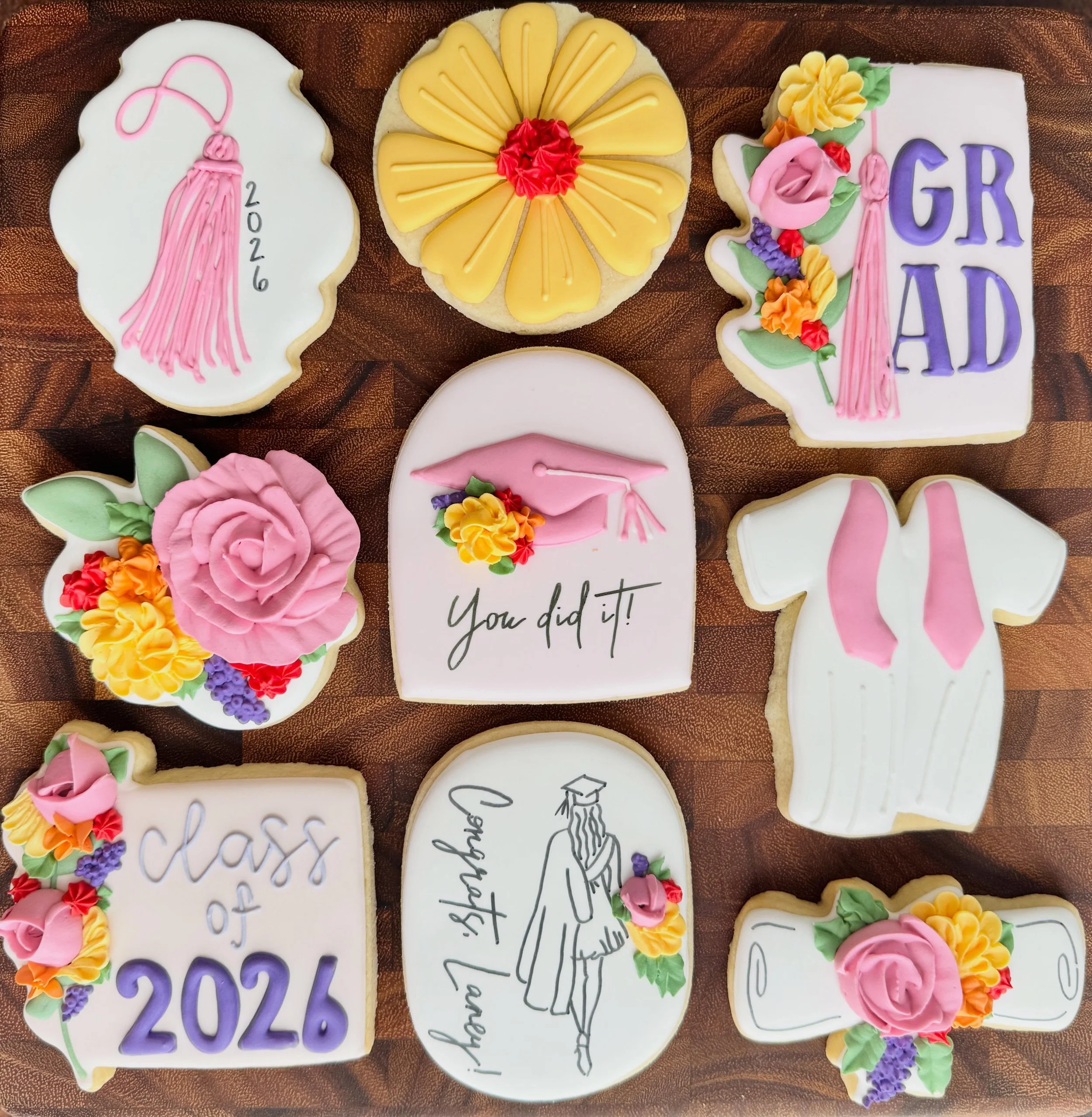 Grad season is officially a wrap with this adorable custom set for a special girl! So excited for you, Laney! 

#saltedsweetsbykeely
#woodstockgabaker
#localcookier
#Classof2026