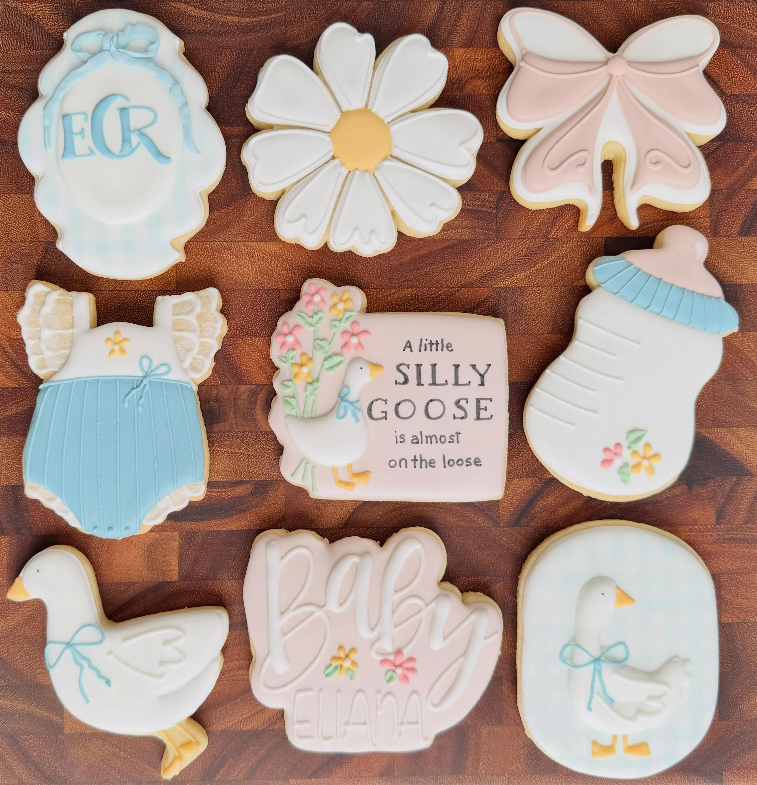 Pretty cookies for an upcoming special arrival! Did someone say a silly goose is almost on the loose??? 🪿💕

#saltedsweetsbykeely
#woodstockgabaker
#localcookier
#ForTheLoveOfCookies
#fortheloveofbabies